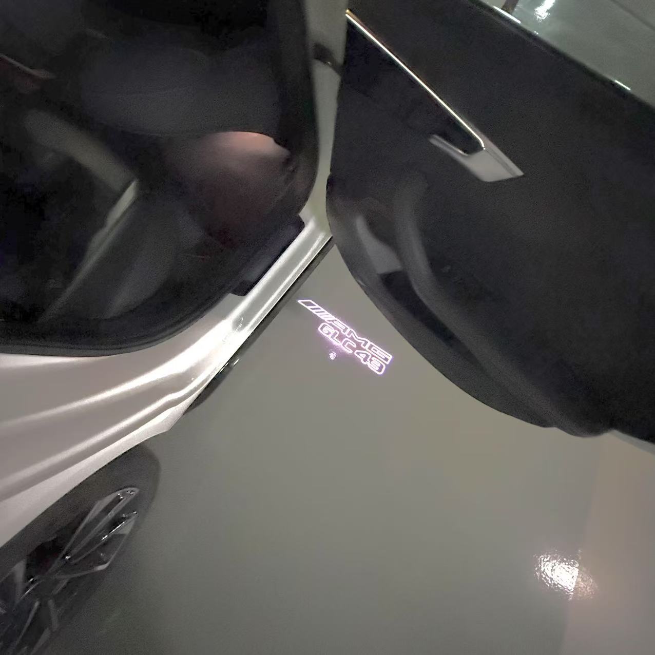 MERCEDES BENZ GLC43 AMG LOGO PROJECTOT LIGHTS  (quantity 1 = 1 set /2 door lights with 2 logo films)Nr.02M354