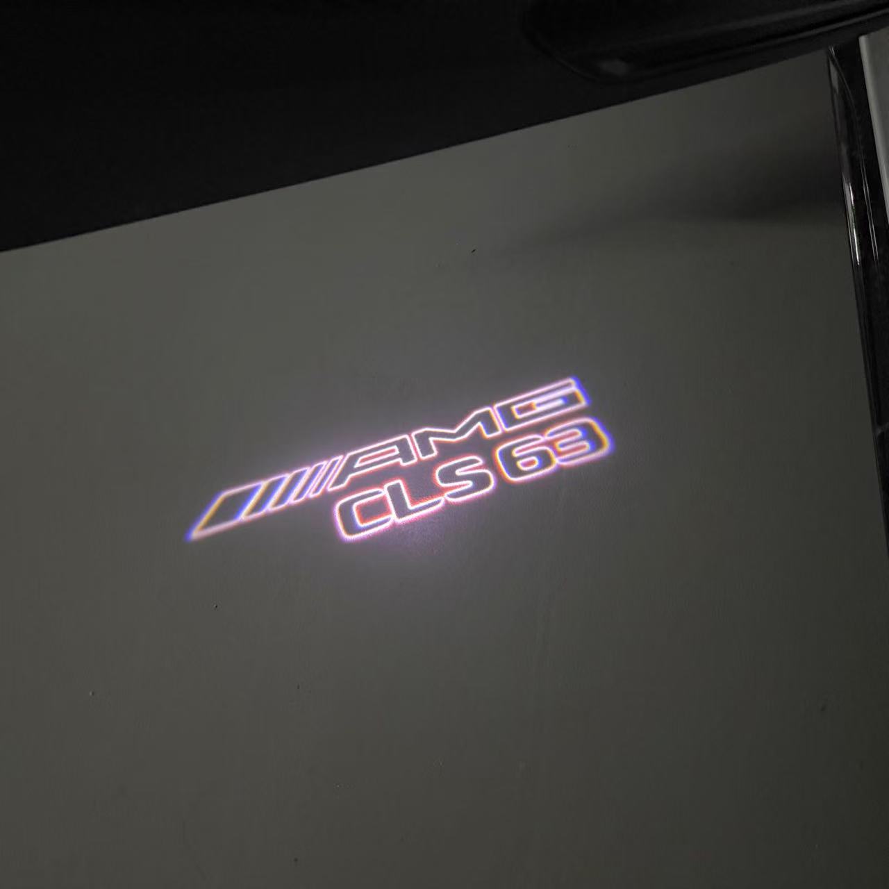 MERCEDES BENZ CLS63 AMG LOGO PROJECTOT LIGHTS  (quantity 1 = 1 set /2 door lights with 2 logo films)Nr.02M281