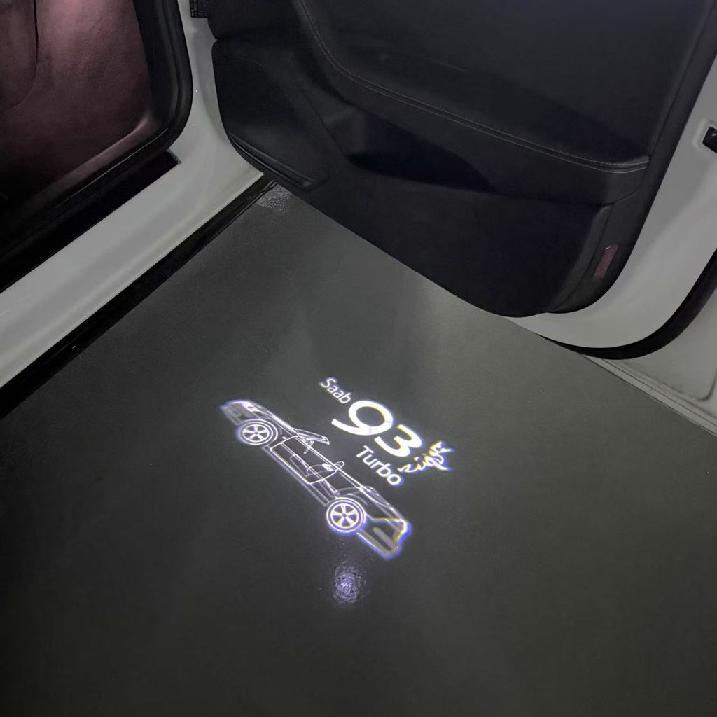 SAAB  Original LOGO PROJECROTR LIGHTS Nr.25184  (quantity 1 = 1 sets/2 door lights)