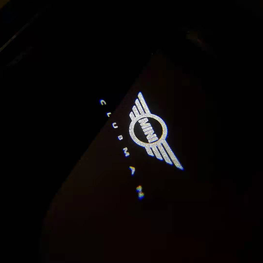 MINI CLUBMAN LOGO PROJECROTR LIGHTS Nr.137 (quantity  1 =  2 Logo Film /  2 door lights)