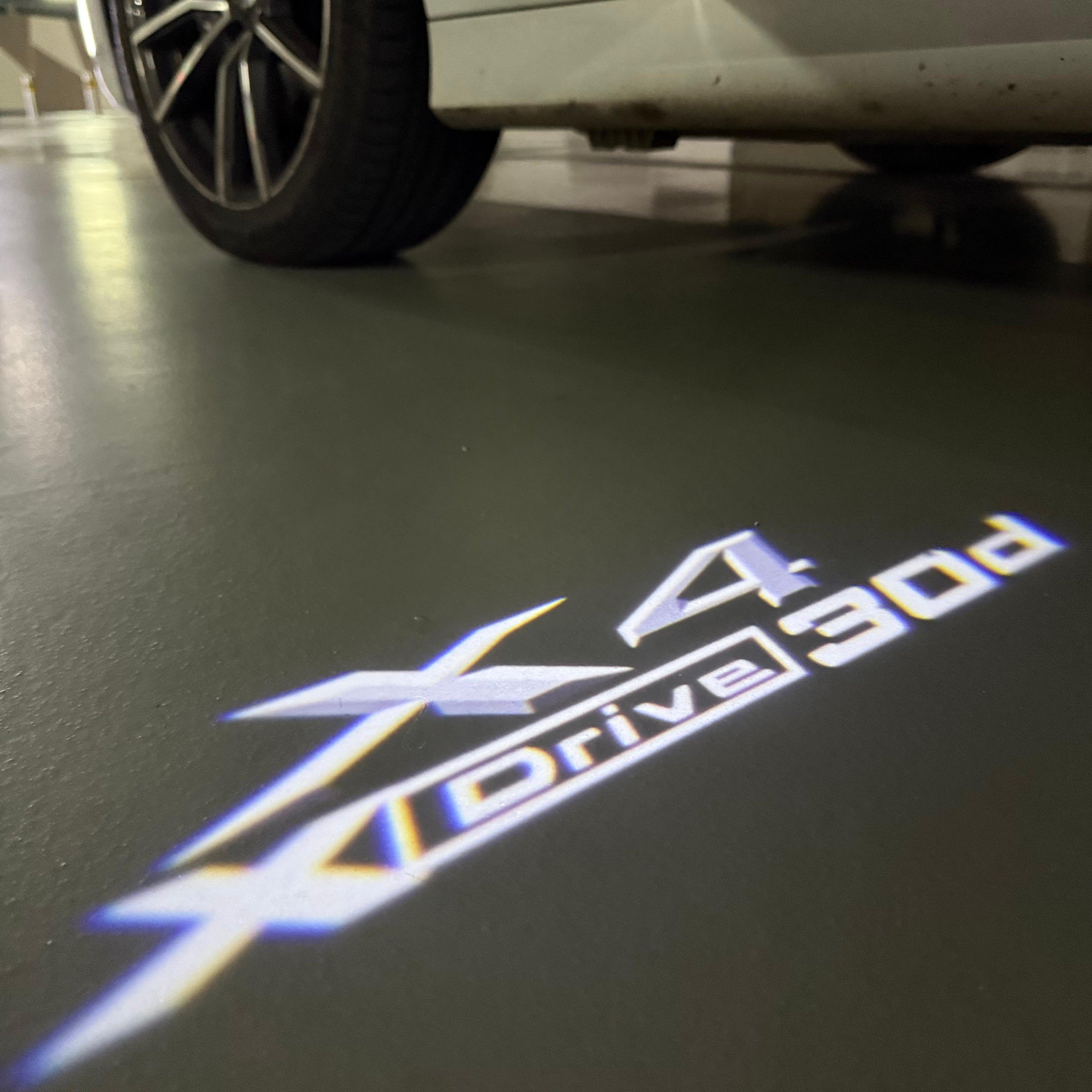 BMW X4 X DRIVE 30d LOGO PROJECTOT LIGHTS (quantity 1 = 1 sets/2 door lights)Nr.bmw0045