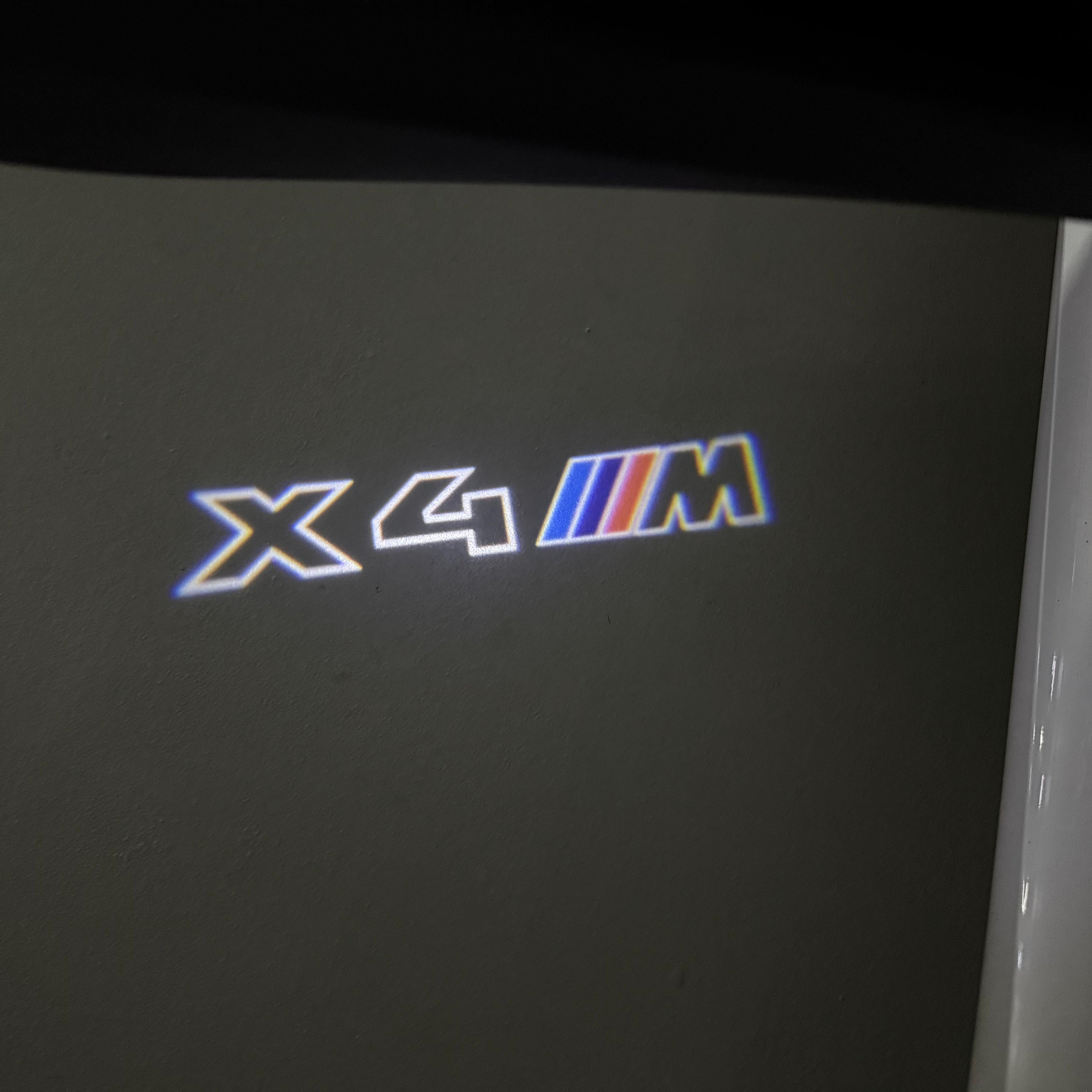 BMW  X4M LOGO PROJECTOT LIGHTS (quantity 1 = 1 sets/2 door lights)Nr.bmw0037