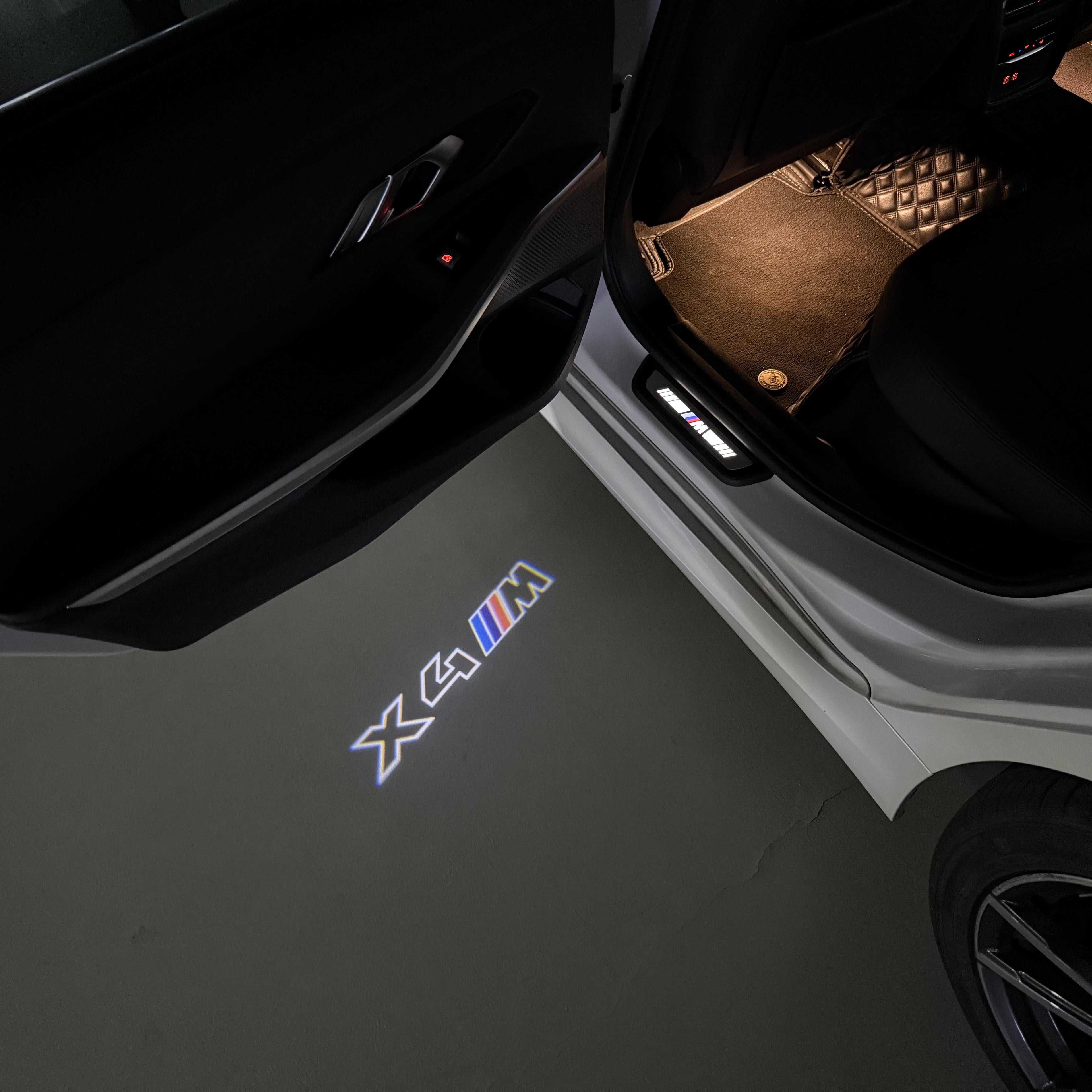 BMW  X4M LOGO PROJECTOT LIGHTS (quantity 1 = 1 sets/2 door lights)Nr.bmw0037