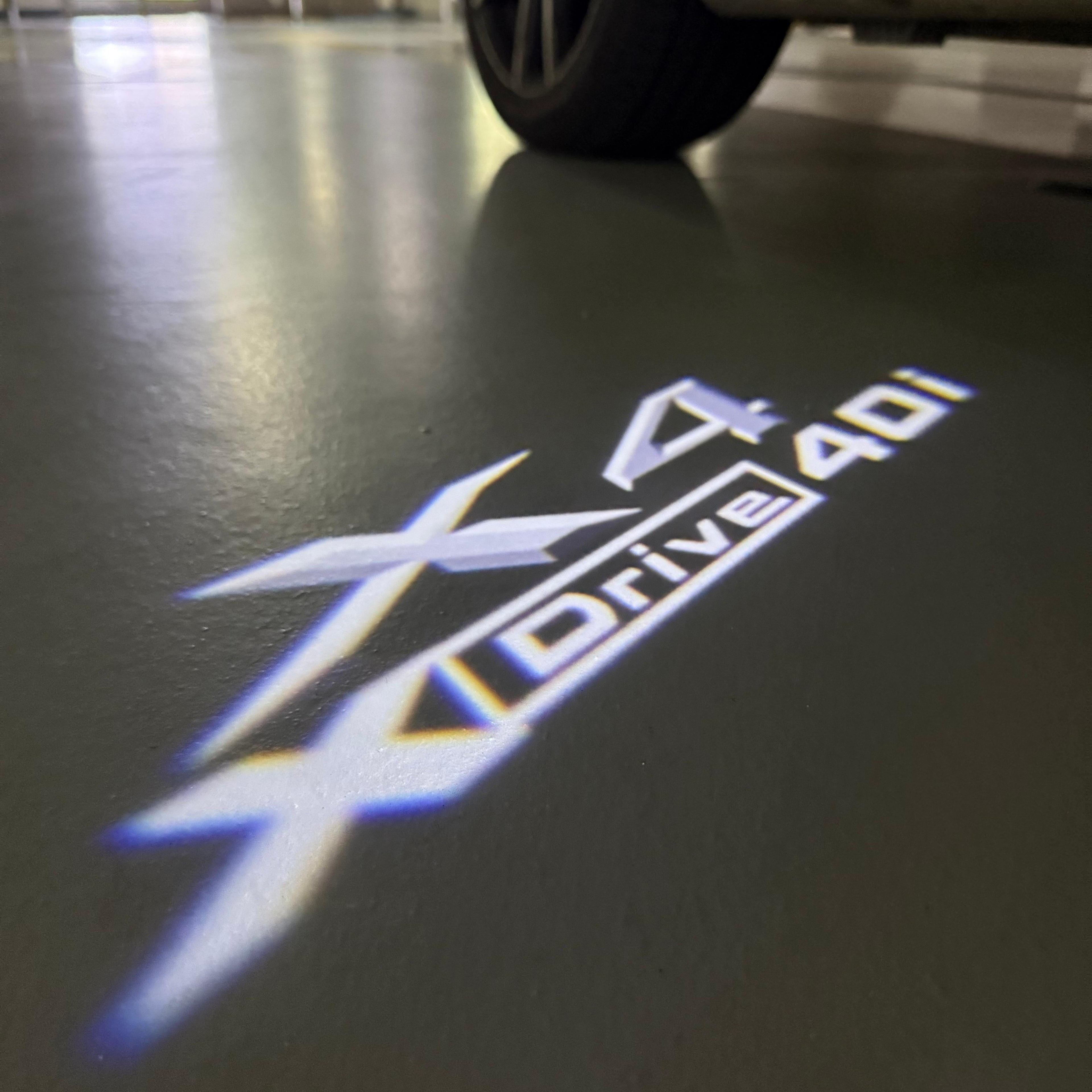 BMW X4 Drive 40i  LOGO PROJECTOT LIGHTS (quantity 1 = 1 sets/2 door lights)Nr.bmw0039