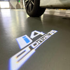 BMW i4 E Drive LOGO PROJECTOT LIGHTS (quantity 1 = 1 sets/2 door lights)Nr.bmw00294