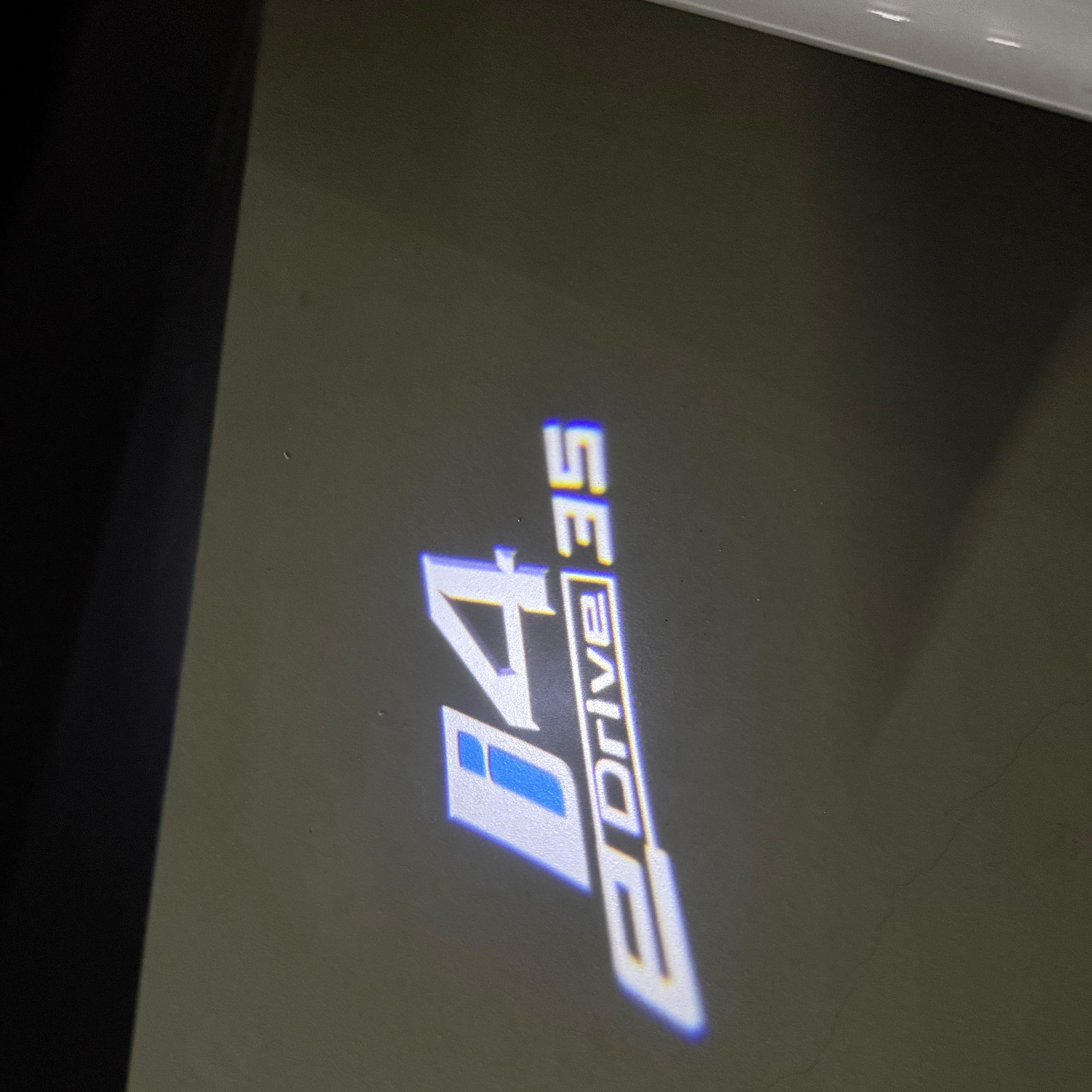 BMW i4 E Drive LOGO PROJECTOT LIGHTS (quantity 1 = 1 sets/2 door lights)Nr.bmw00294