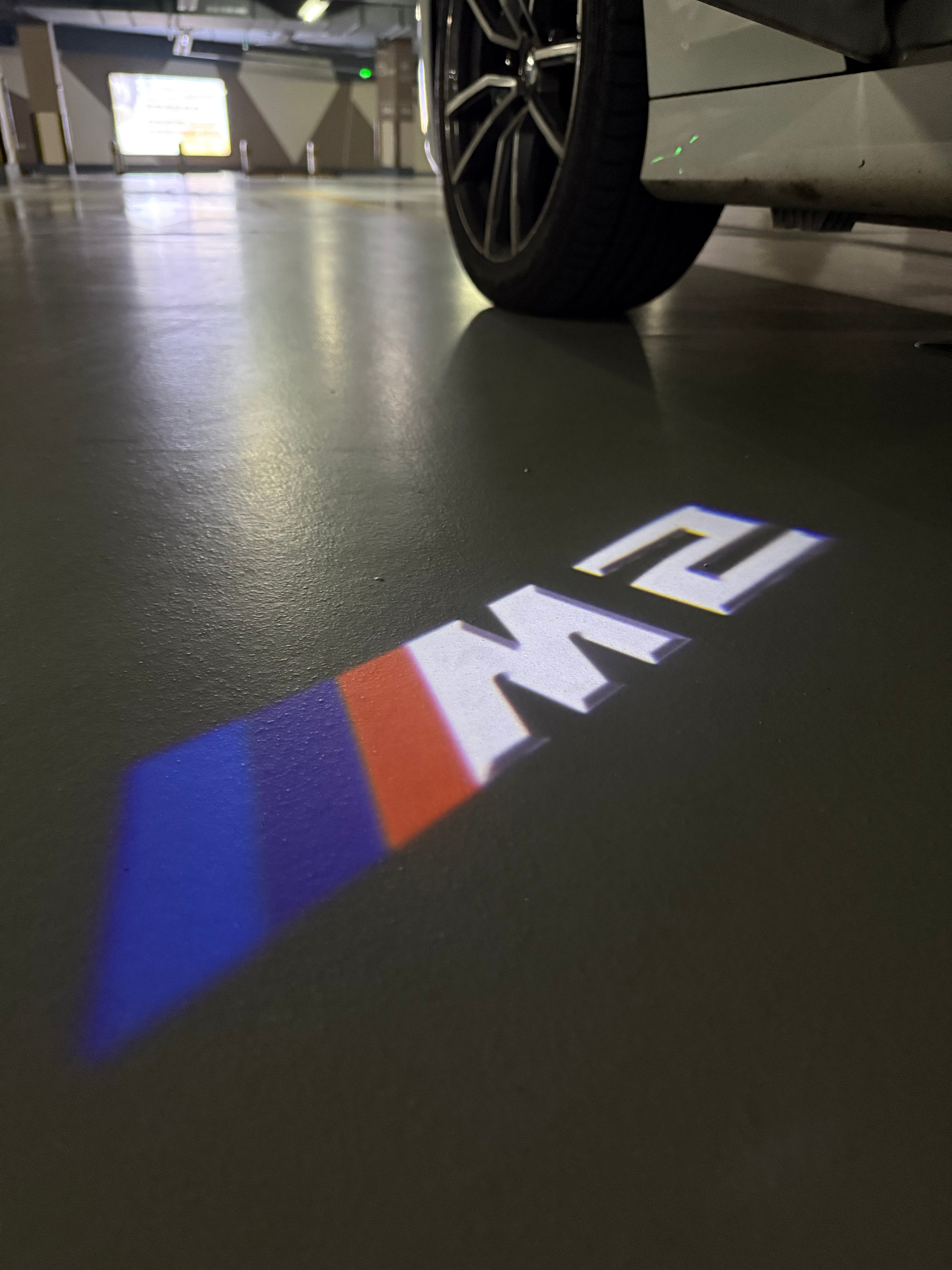 BMW 2 SERIES M2  LOGO PROJECTOT LIGHTS (quantity 1 = 1 sets/2 door lights)Nr.bmw00211