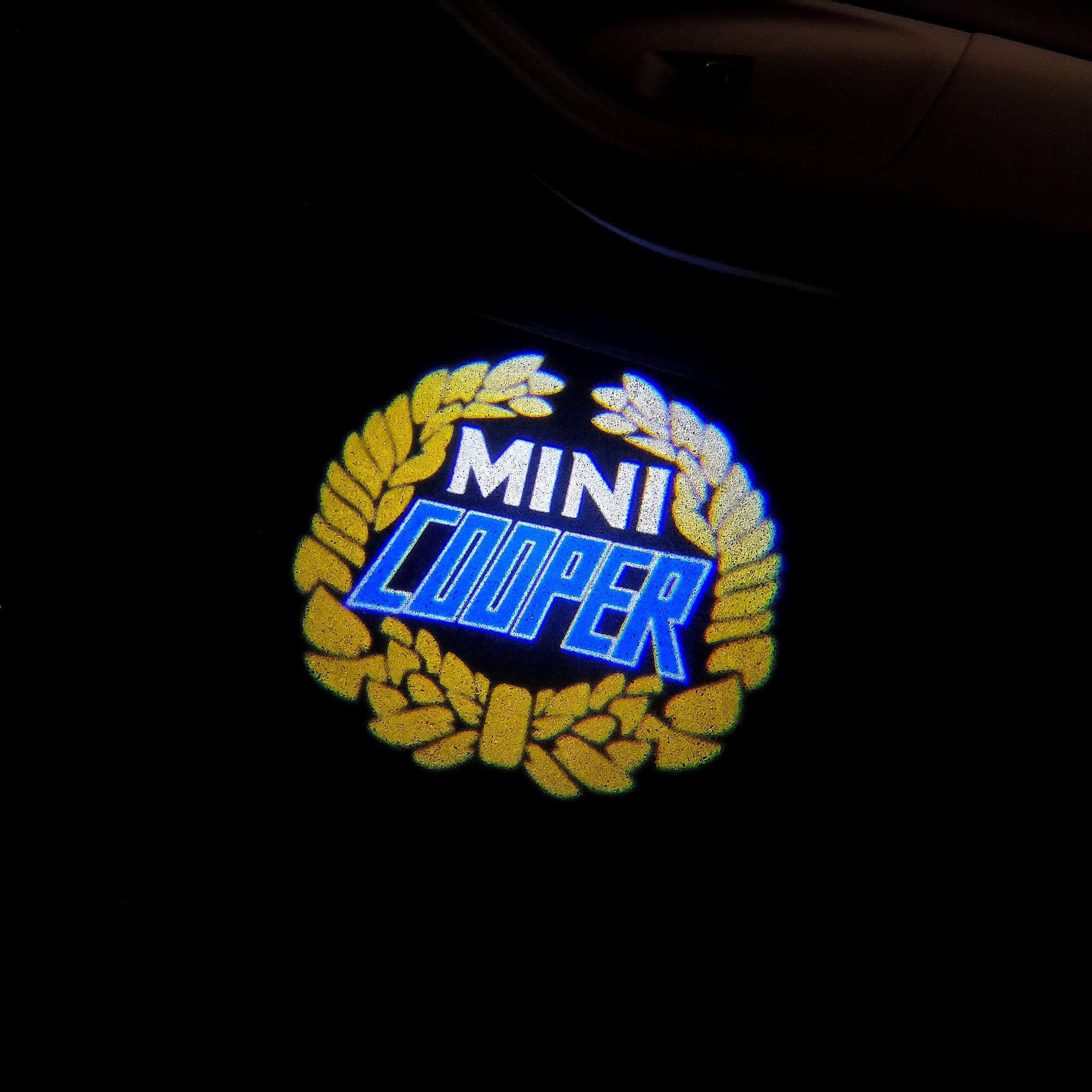 MINI COOPER LOGO PROJECROTR LIGHTS Nr.33 (quantity  1 =  2 Logo Film /  2 door lights)