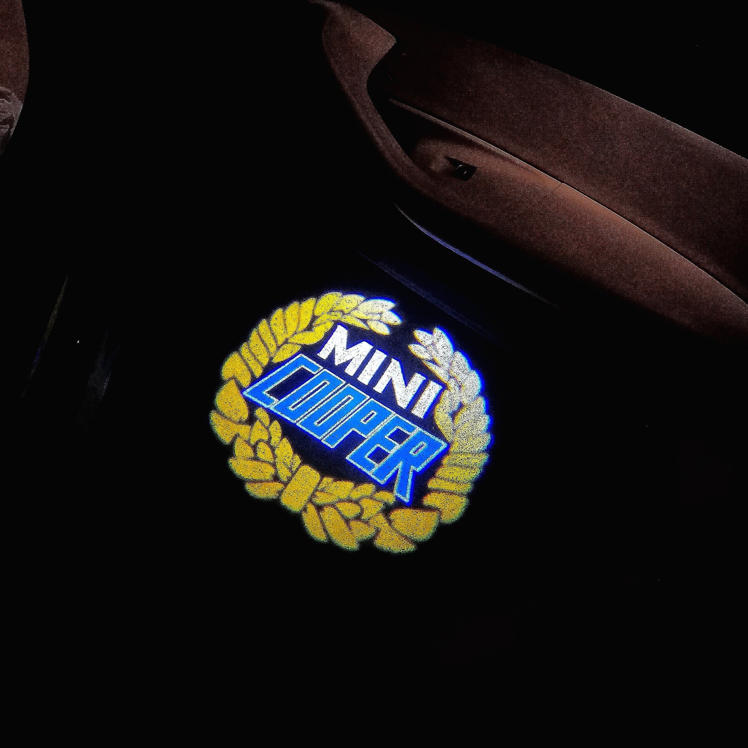 MINI COOPER LOGO PROJECROTR LIGHTS Nr.33 (quantity  1 =  2 Logo Film /  2 door lights)