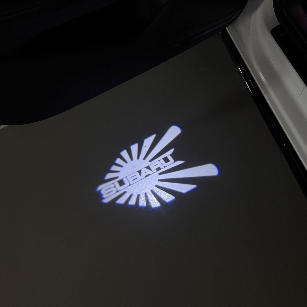 SUBARU Original LOGO PROJECROTR LIGHTS (quantity 1 = 1 sets/2 door lights) Nr.03d13