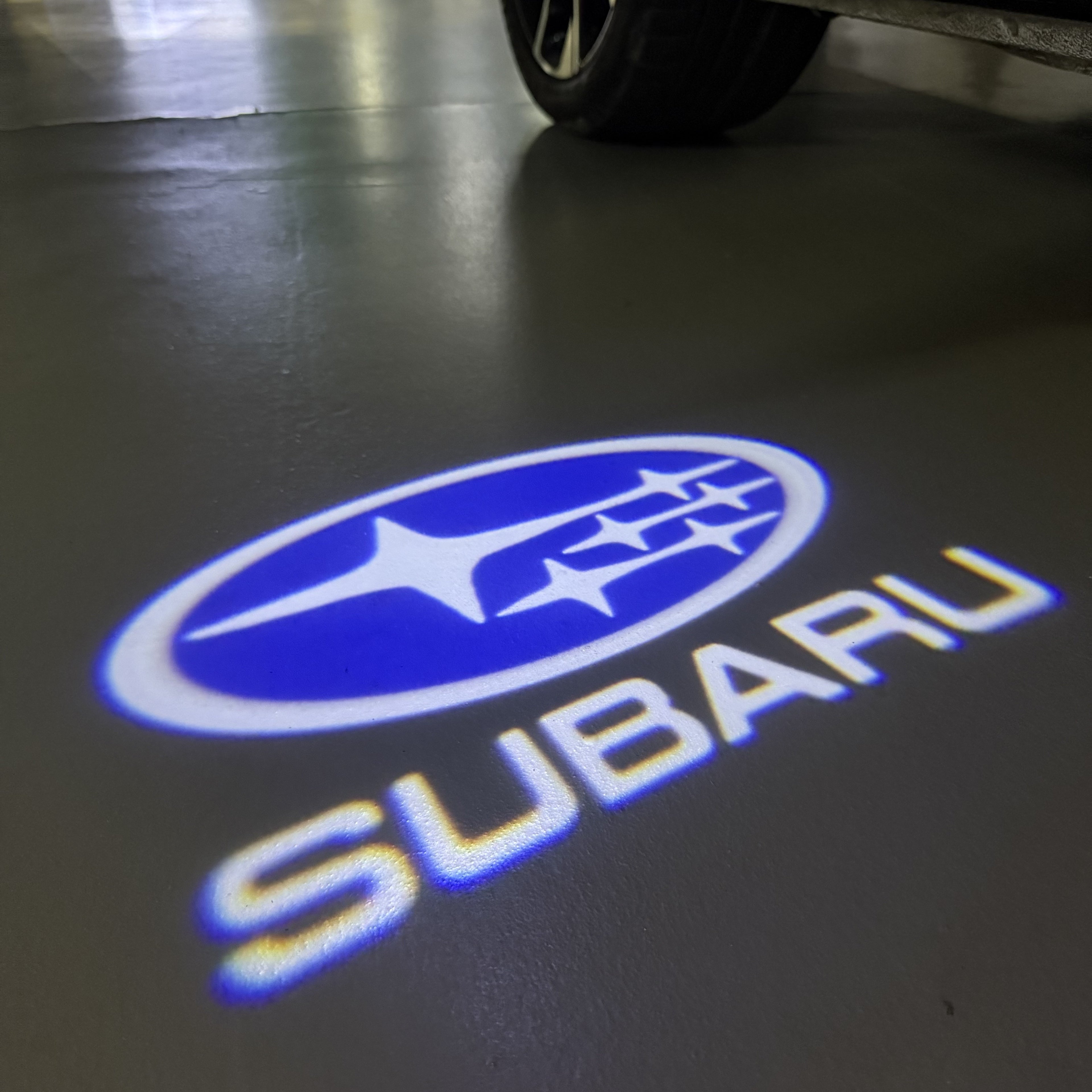 SUBARU Original LOGO PROJECROTR LIGHTS (quantity 1 = 1 sets/2 door lights) Nr.03d16