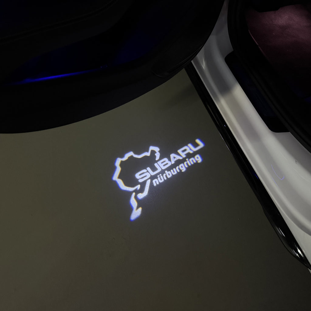 SUBARU Original LOGO PROJECROTR LIGHTS (quantity 1 = 1 sets/2 door lights) Nr.03d15