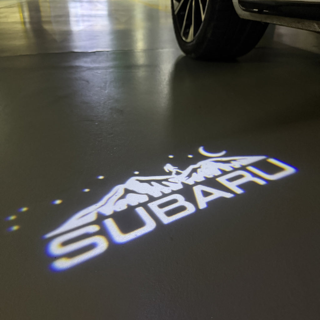 SUBARU Original LOGO PROJECROTR LIGHTS (quantity 1 = 1 sets/2 door lights) Nr.03d17