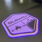SUBARU Original LOGO PROJECROTR LIGHTS (quantity 1 = 1 sets/2 door lights) Nr.03d12