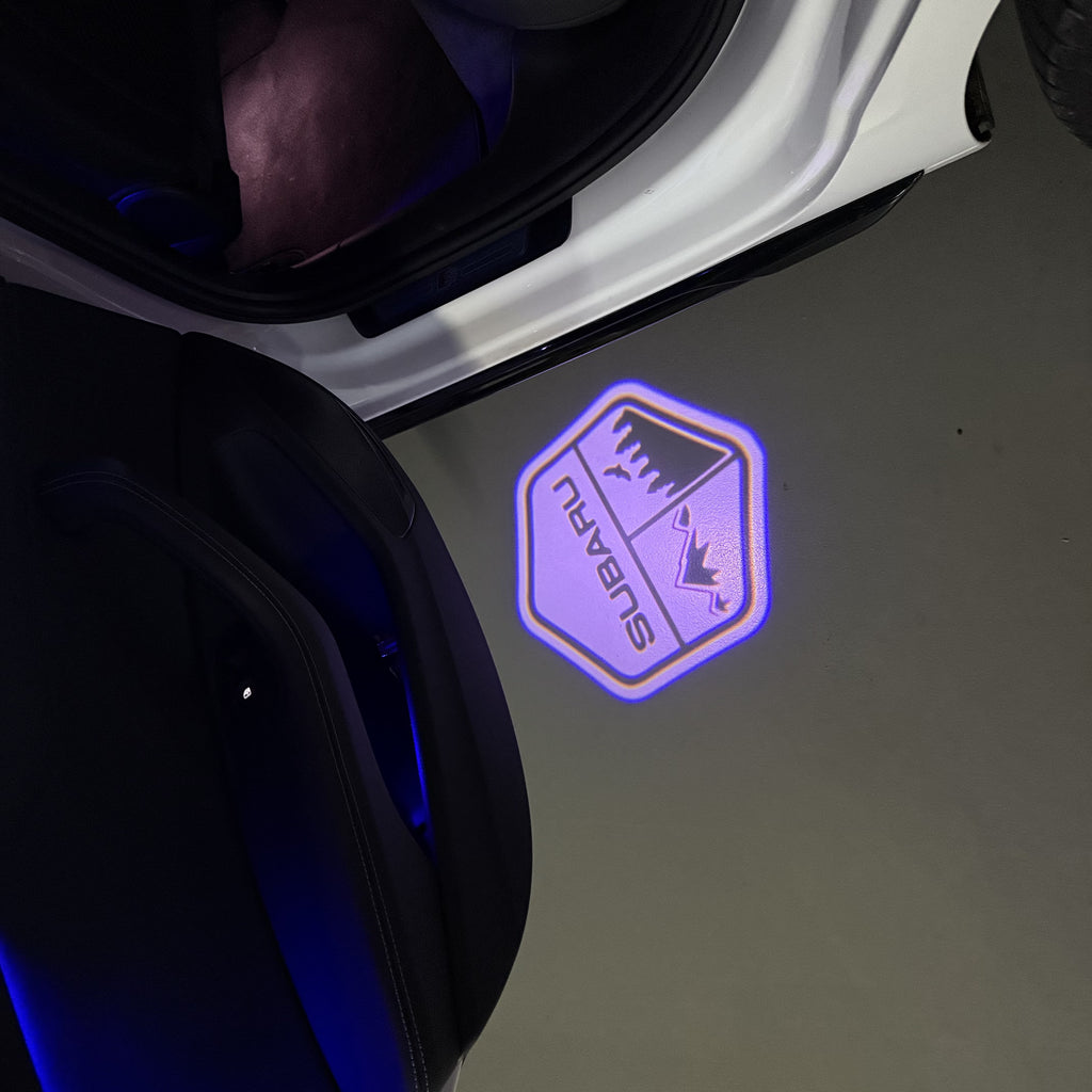 SUBARU Original LOGO PROJECROTR LIGHTS (quantity 1 = 1 sets/2 door lights) Nr.03d12