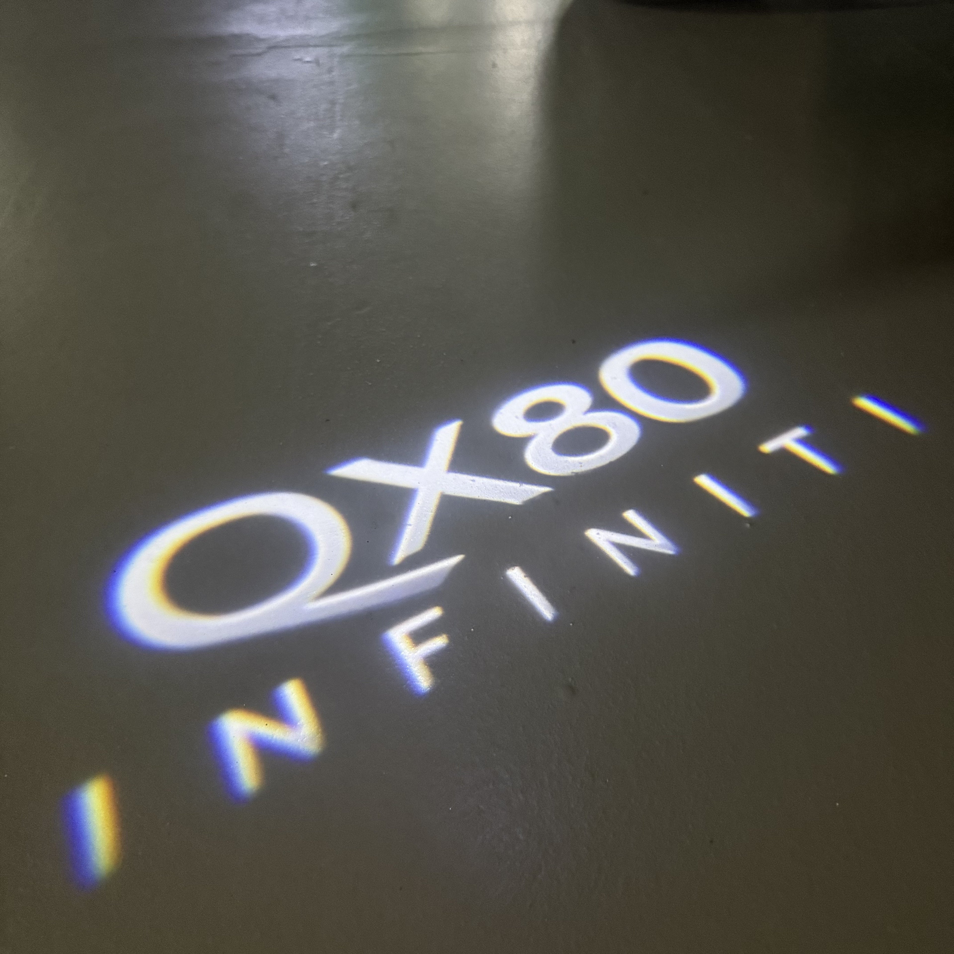 INFINITI  QX 80 LOGO PROJECROTR LIGHTS (quantity 1 = 1 sets/2 door lights) Nr.47X23