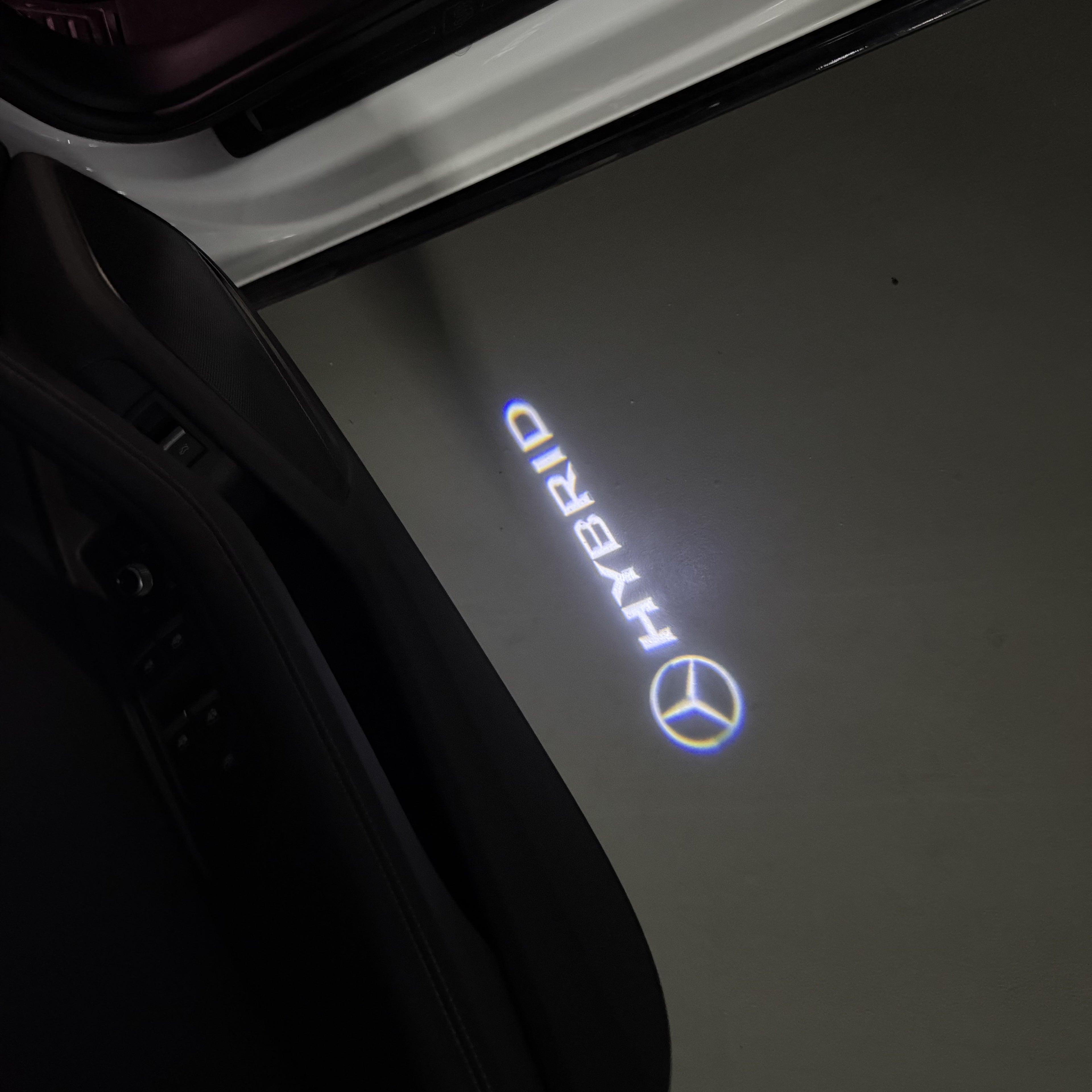 MERCEDES BENZ HYBRID LOGO PROJECTOT LIGHTS  (quantity 1 = 1 set /2 door lights with 2 logo films)Nr.02M248
