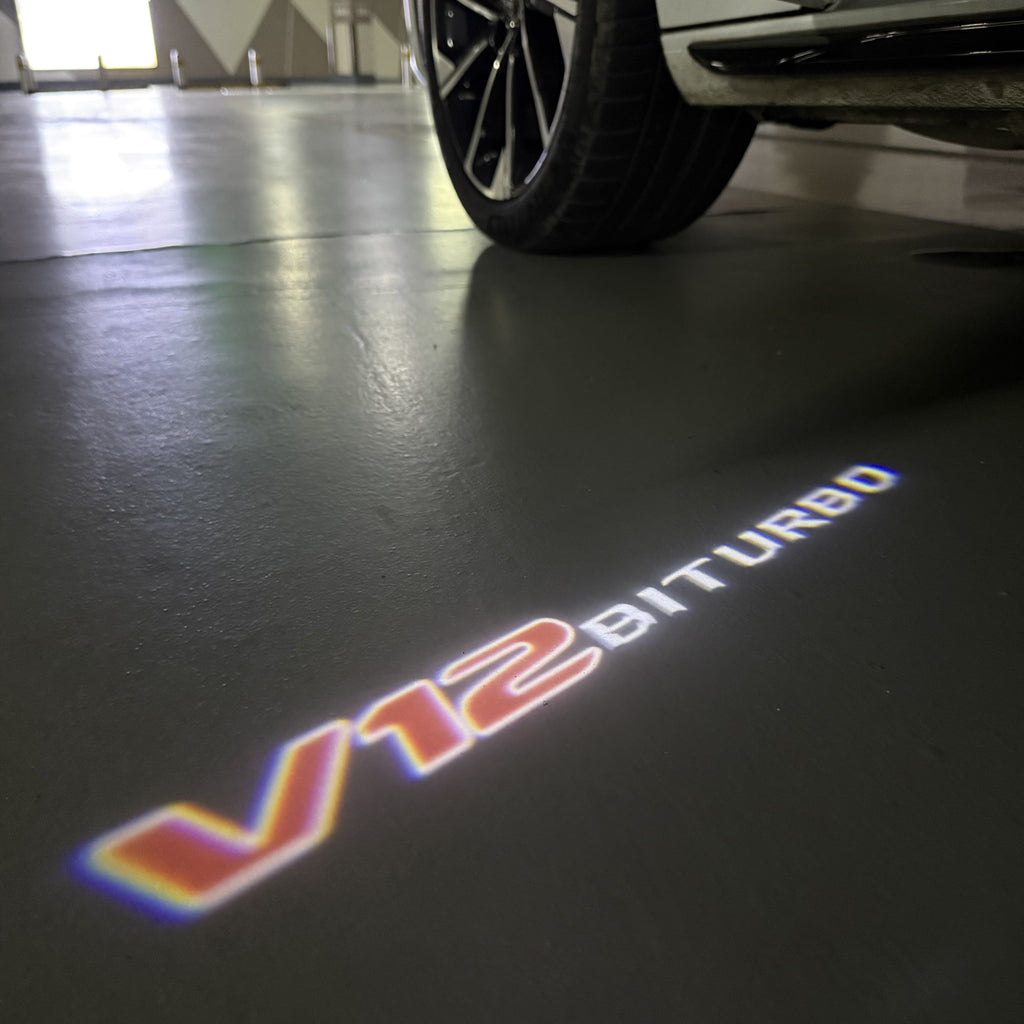 MERCEDES BENZ V12 LOGO PROJECTOT LIGHTS  (quantity 1 = 1 set /2 door lights with 2 logo films)Nr.02M233