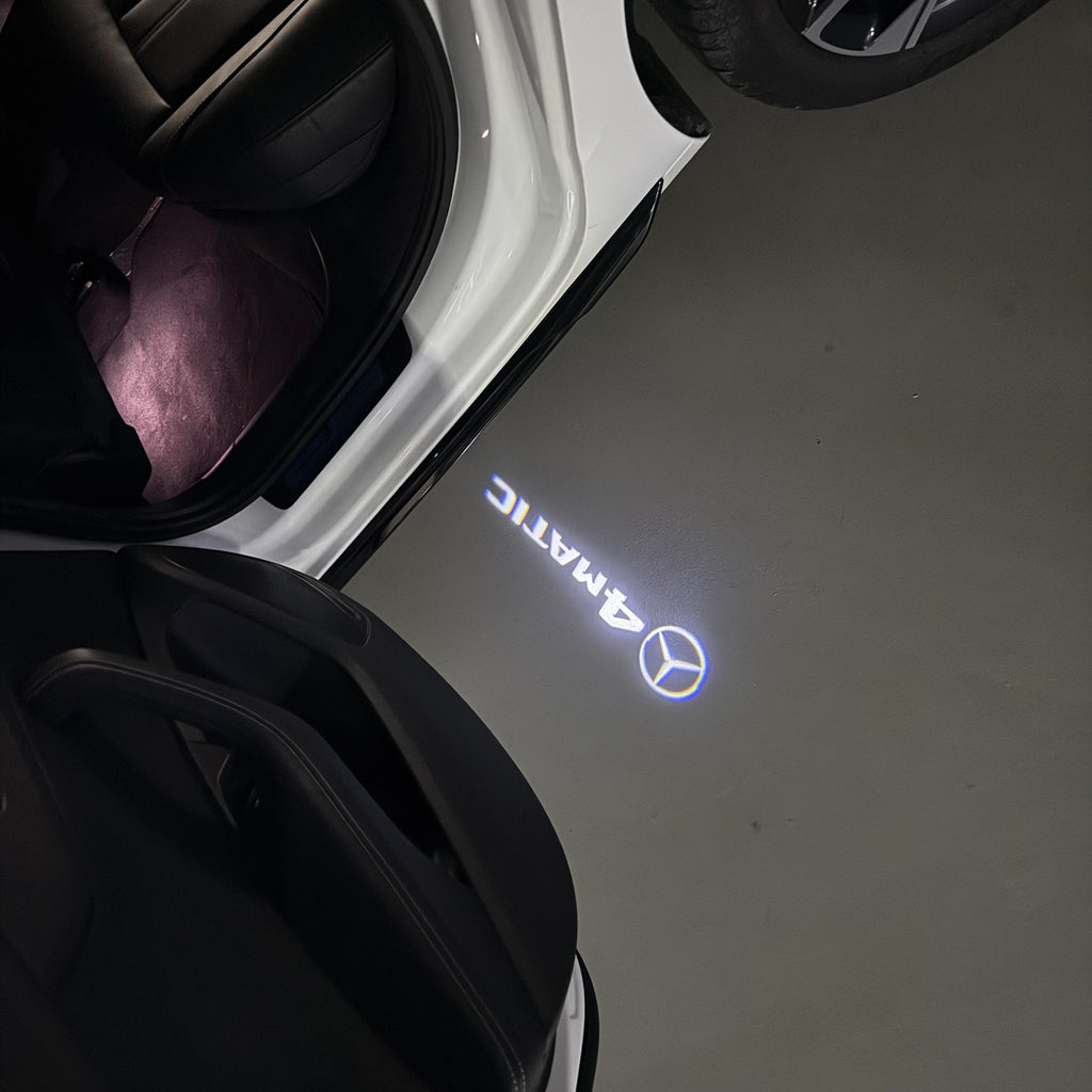 MERCEDES BENZ 4 MATIC LOGO PROJECTOT LIGHTS  (quantity 1 = 1 set /2 door lights with 2 logo films)Nr.02M250