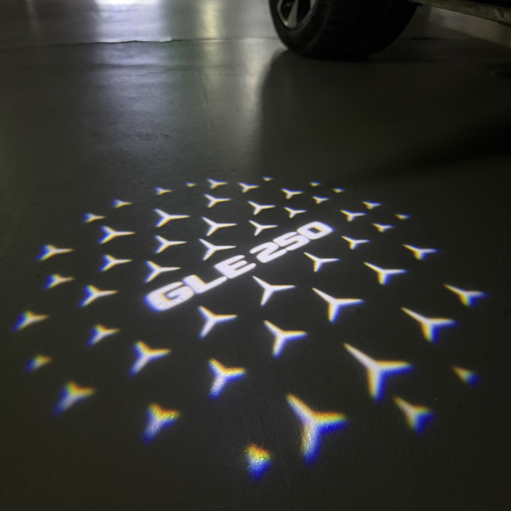 MERCEDES BENZ GLE 250 LOGO PROJECTOT LIGHTS  (quantity 1 = 1 set /2 door lights with 2 logo films)Nr.02M448