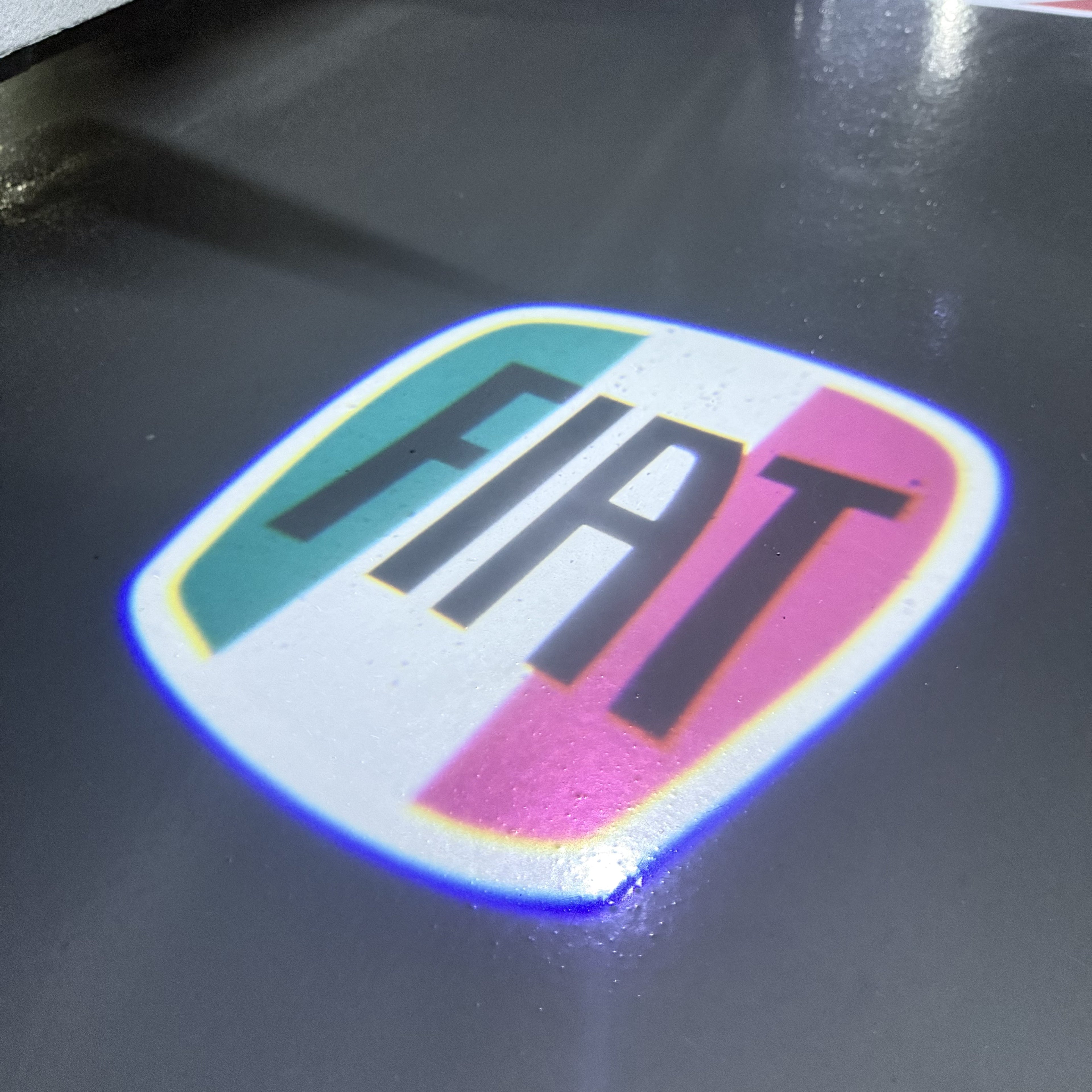 FIAT ORIGINAL LOGO PROJECTOT LIGHTS  (quantity  1 =  2 Logo Film /  2 door lights)Nr.48ER20