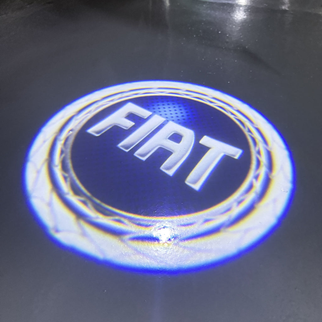 FIAT ORIGINALLOGO PROJECTOT LIGHTS  (quantity  1 =  2 Logo Film /  2 door lights)Nr.48ER28