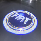 FIAT ORIGINALLOGO PROJECTOT LIGHTS  (quantity  1 =  2 Logo Film /  2 door lights)Nr.48ER28