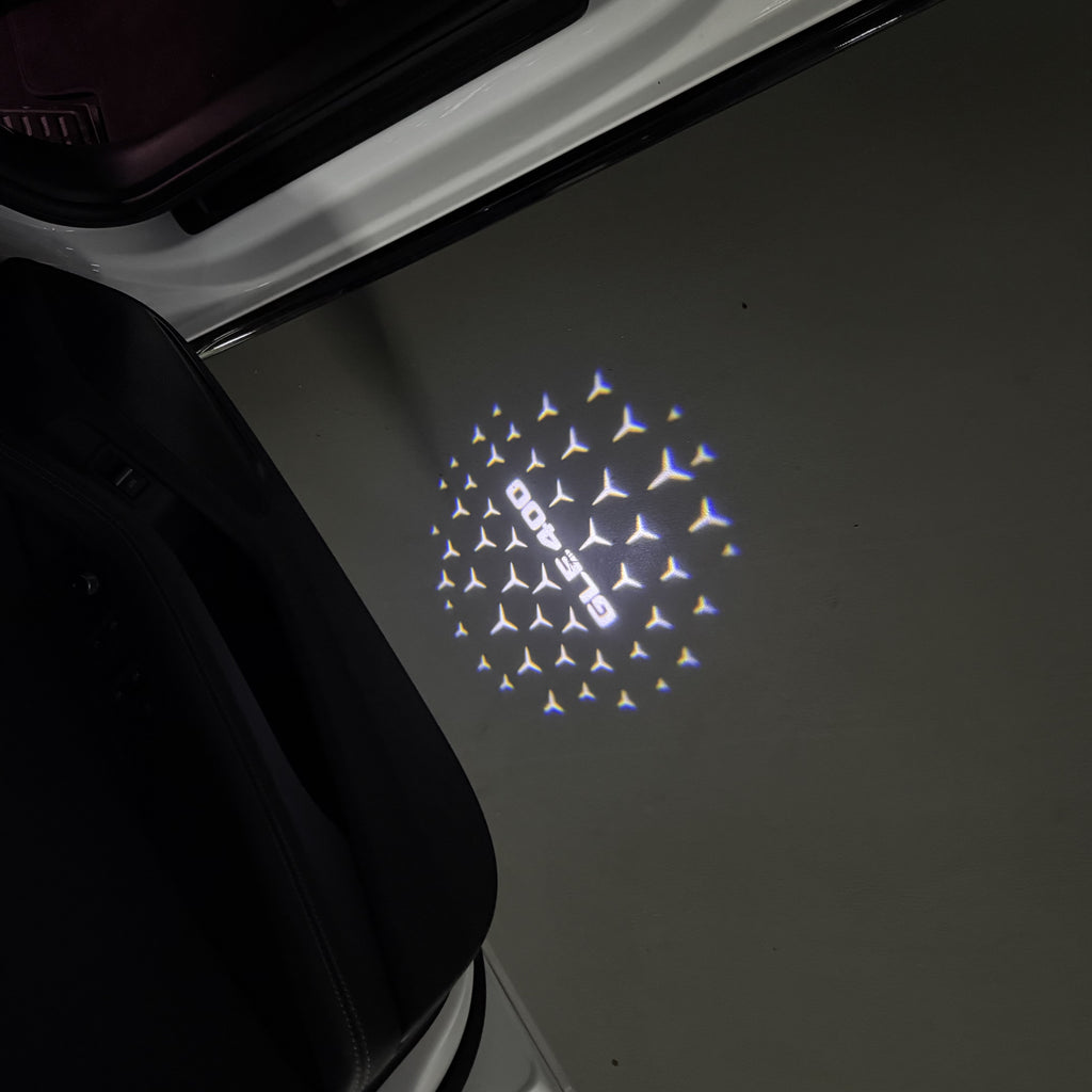 MERCEDES BENZ GLE 400 LOGO PROJECTOT LIGHTS  (quantity 1 = 1 set /2 door lights with 2 logo films)Nr.02M454