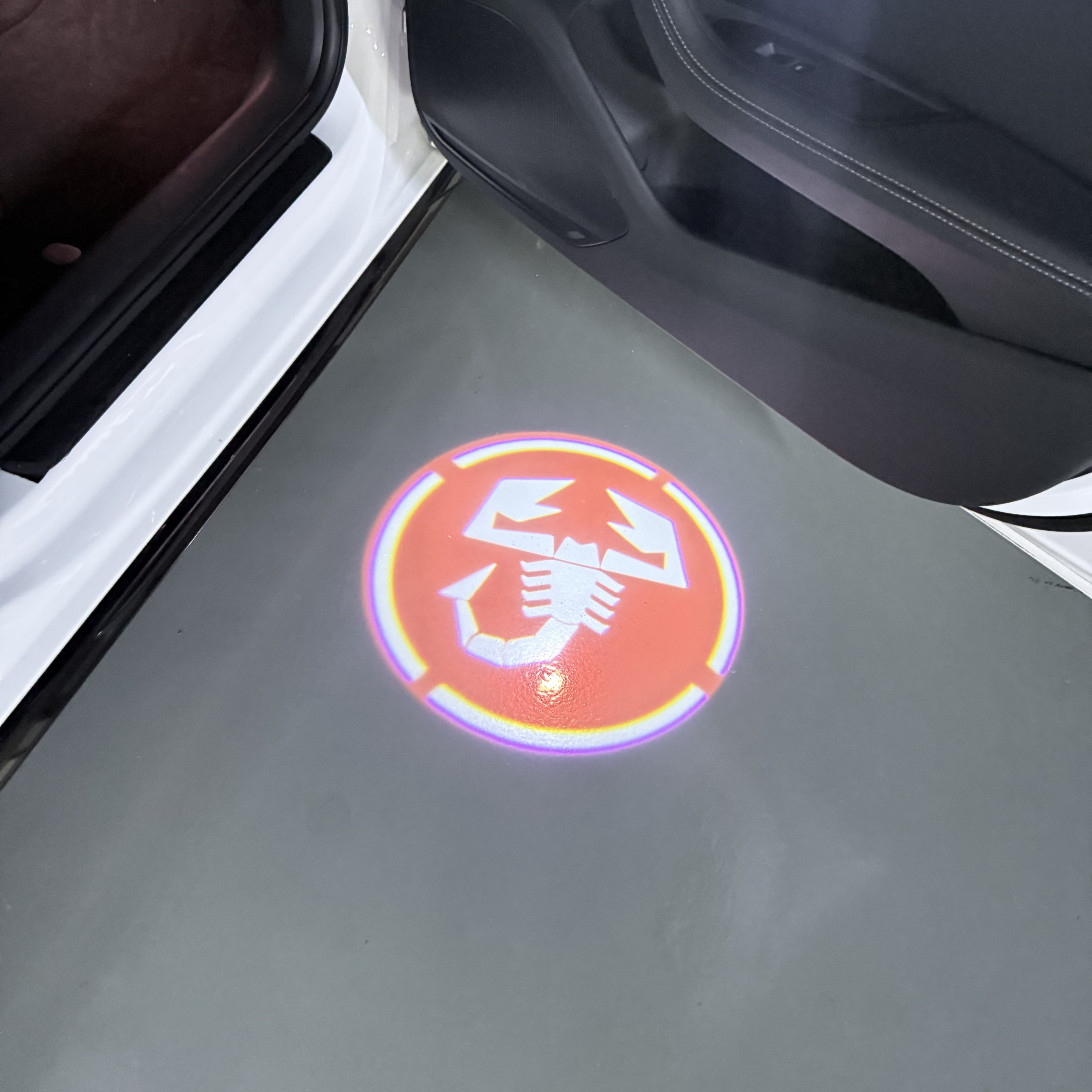 FIAT ABARTH LOGO PROJECTOT LIGHTS  (quantity  1 =  2 Logo Film /  2 door lights)Nr.48ER15