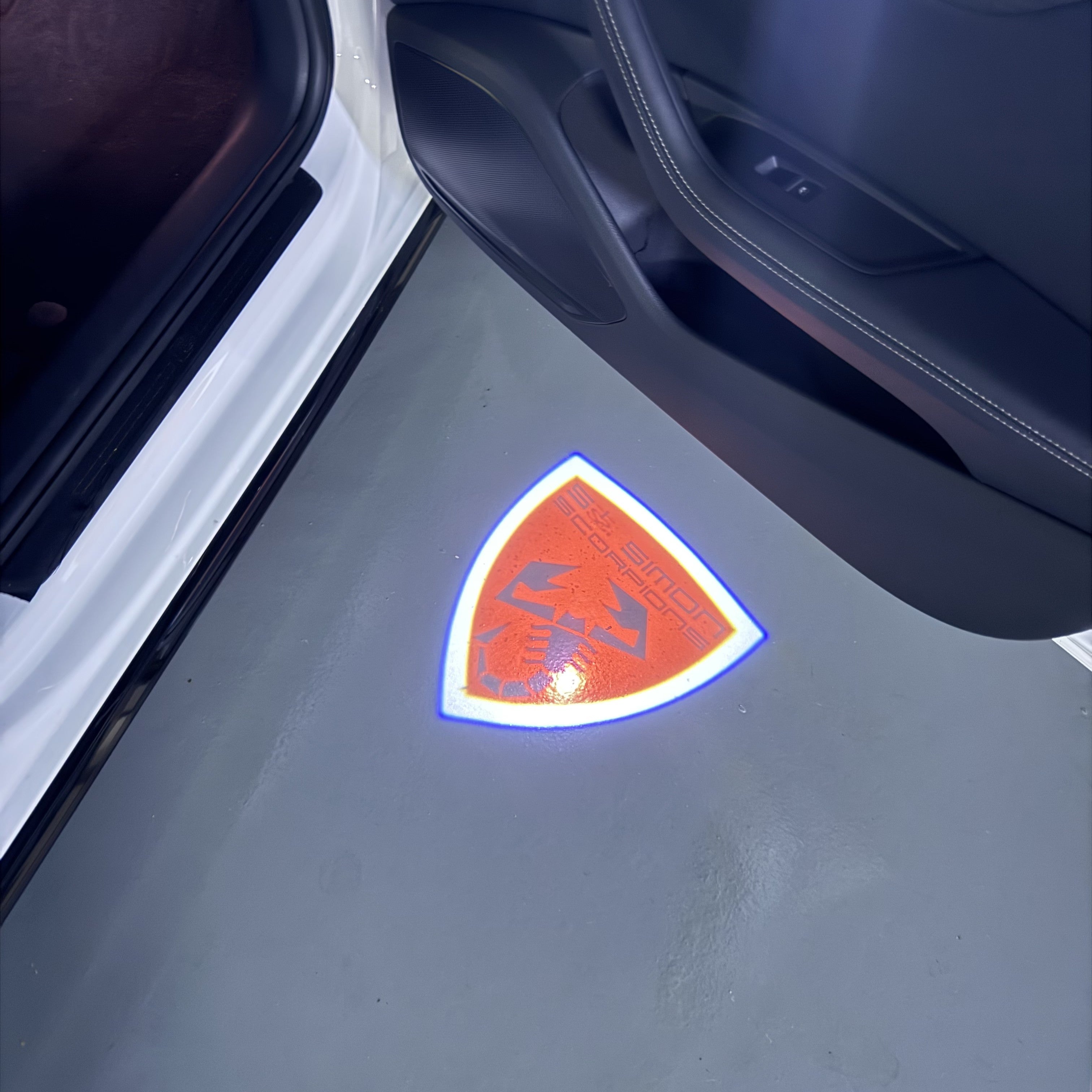 FIAT ABARTH  LOGO PROJECTOT LIGHTS  (quantity  1 =  2 Logo Film /  2 door lights)Nr.48ER26