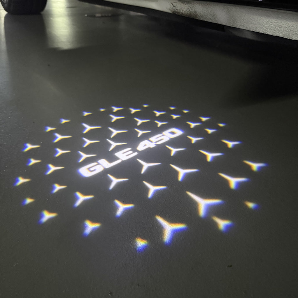 MERCEDES BENZ GLE 450 LOGO PROJECTOT LIGHTS  (quantity 1 = 1 set /2 door lights with 2 logo films)Nr.02M455