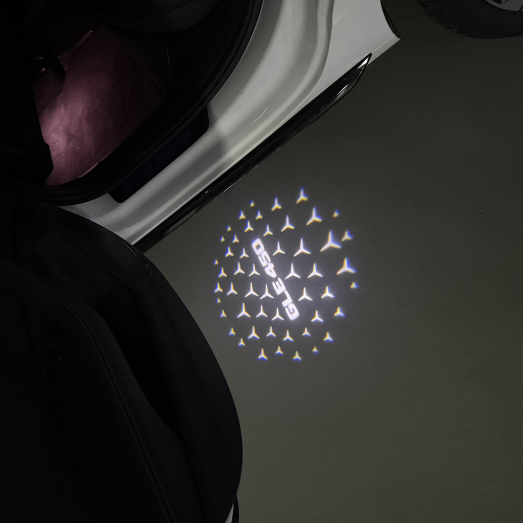 MERCEDES BENZ GLE 450 LOGO PROJECTOT LIGHTS  (quantity 1 = 1 set /2 door lights with 2 logo films)Nr.02M455