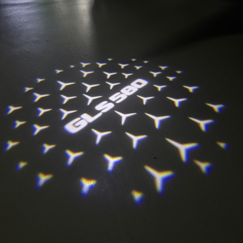 MERCEDES BENZ GLS 580 LOGO PROJECTOT LIGHTS  (quantity 1 = 1 set /2 door lights with 2 logo films)Nr.02M475