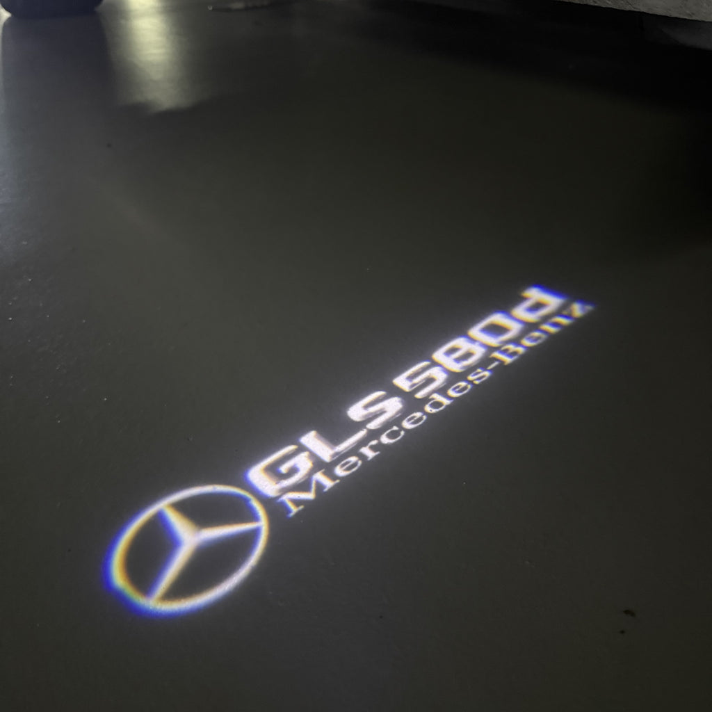 MERCEDES BENZ GLS 580d LOGO PROJECTOT LIGHTS  (quantity 1 = 1 set /2 door lights with 2 logo films)Nr.02M477