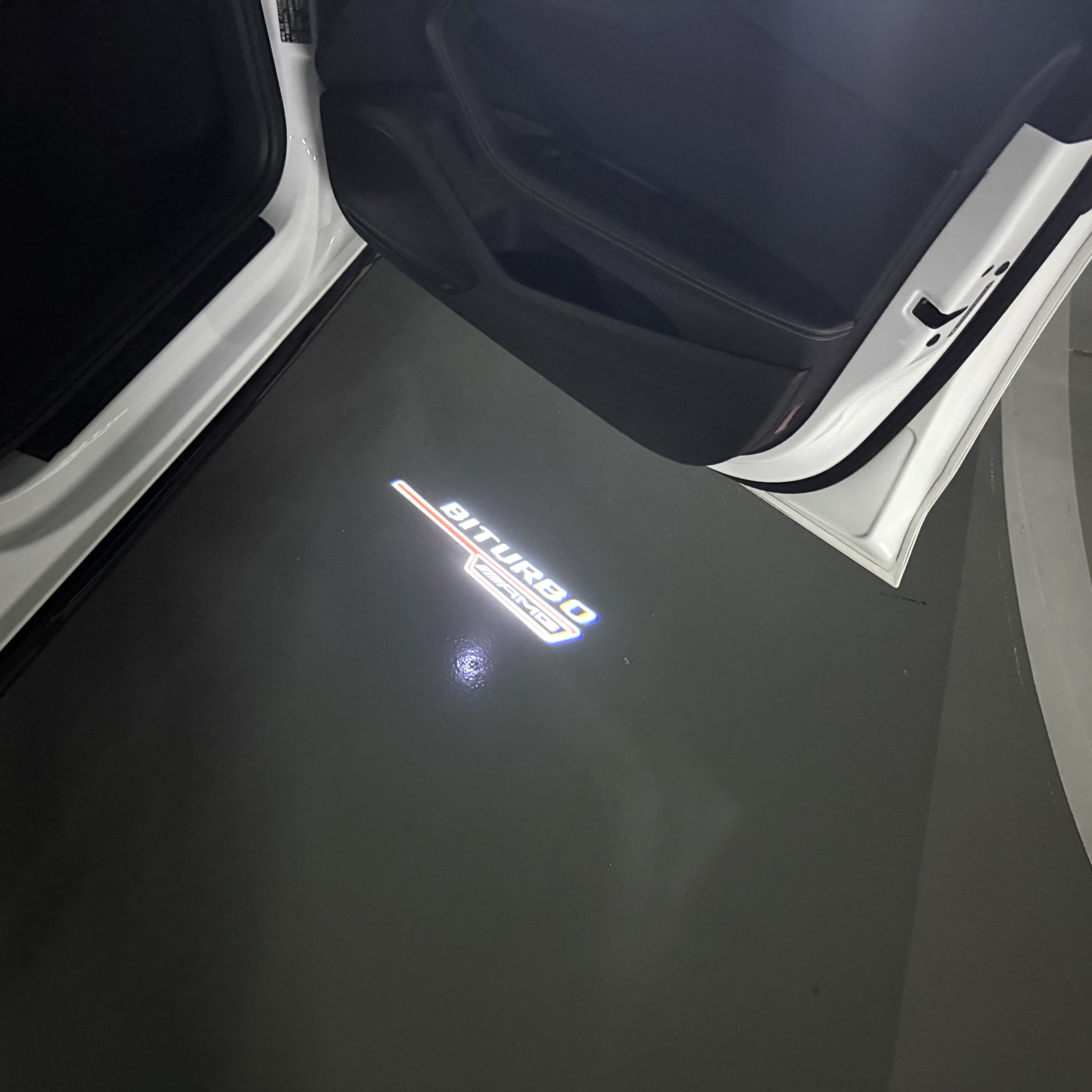 MERCEDES BENZ BITURBO LOGO PROJECTOT LIGHTS  (quantity 1 = 1 set /2 door lights with 2 logo films)Nr.02M252