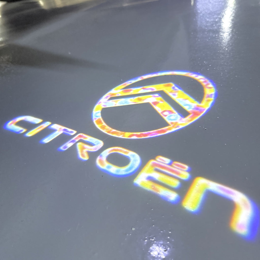 CITROËN ORIGINAL LOGO PROJECTOT LIGHTS (quantity 1 = 2 Logo Films /2 door lights）Nr.2805S13b10