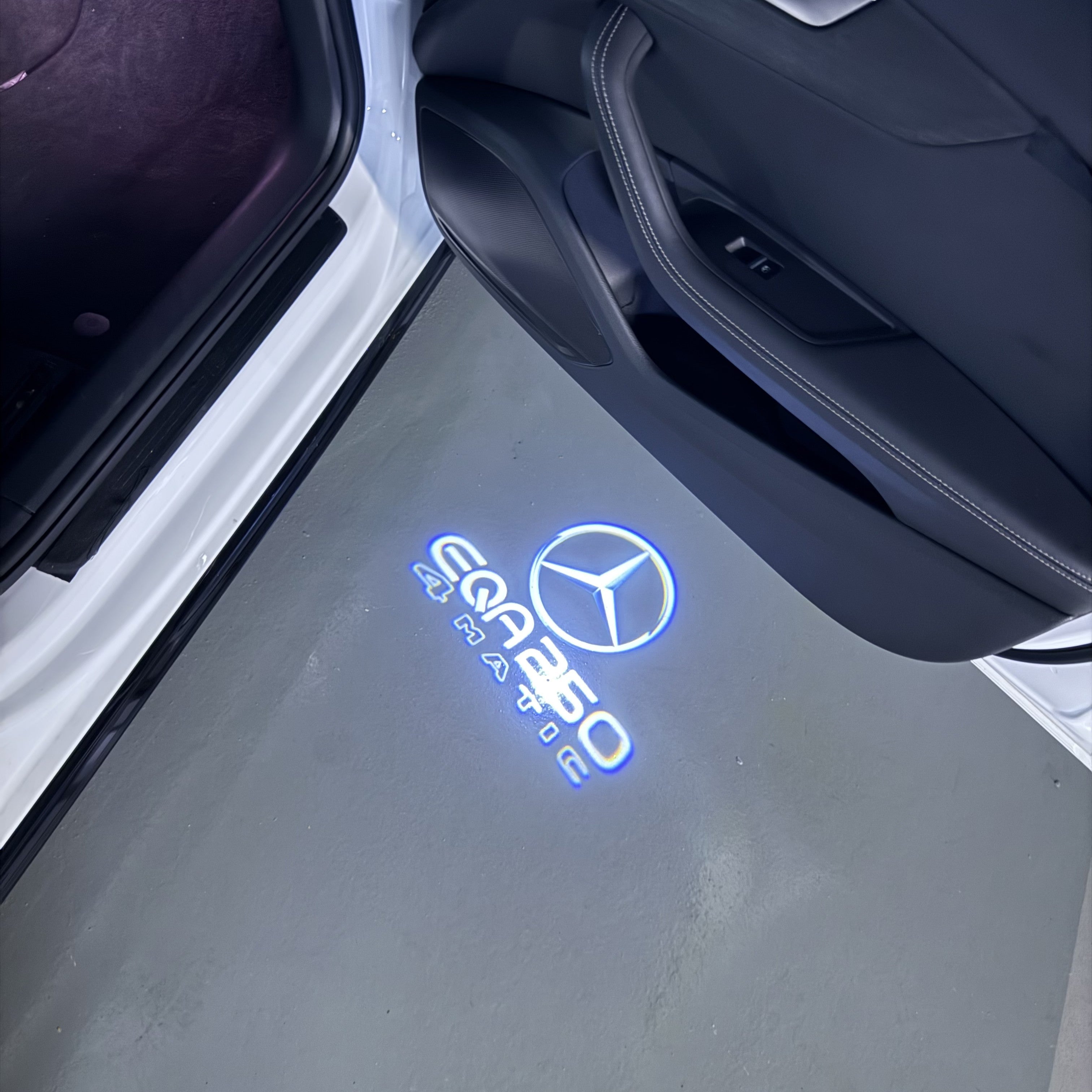 MERCEDES BENZ EQA 250 LOGO PROJECTOT LIGHTS  (quantity 1 = 1 set /2 door lights with 2 logo films)Nr.02M153