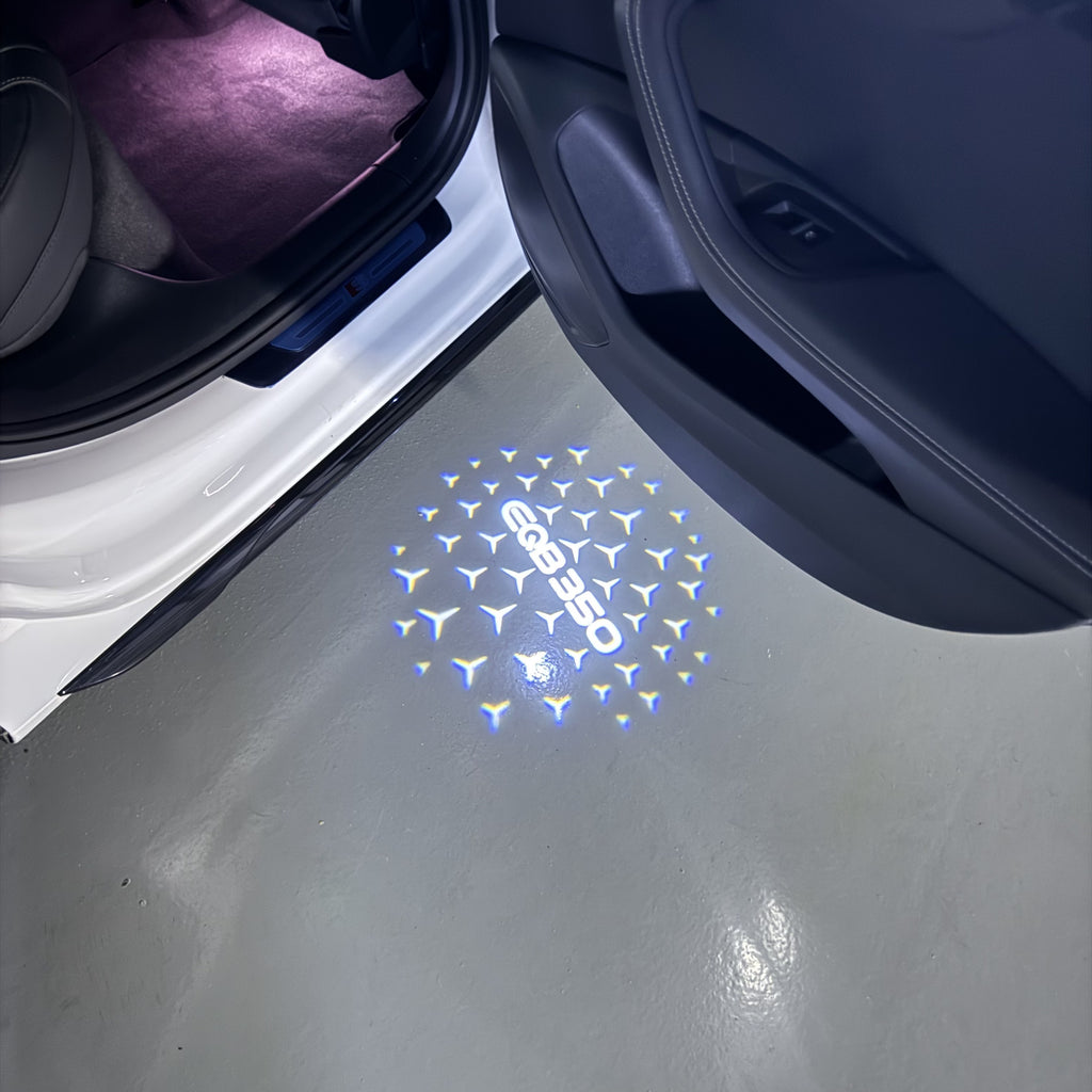 MERCEDES BENZ EQB 350 LOGO PROJECTOT LIGHTS  (quantity 1 = 1 set /2 door lights with 2 logo films)Nr.02M154