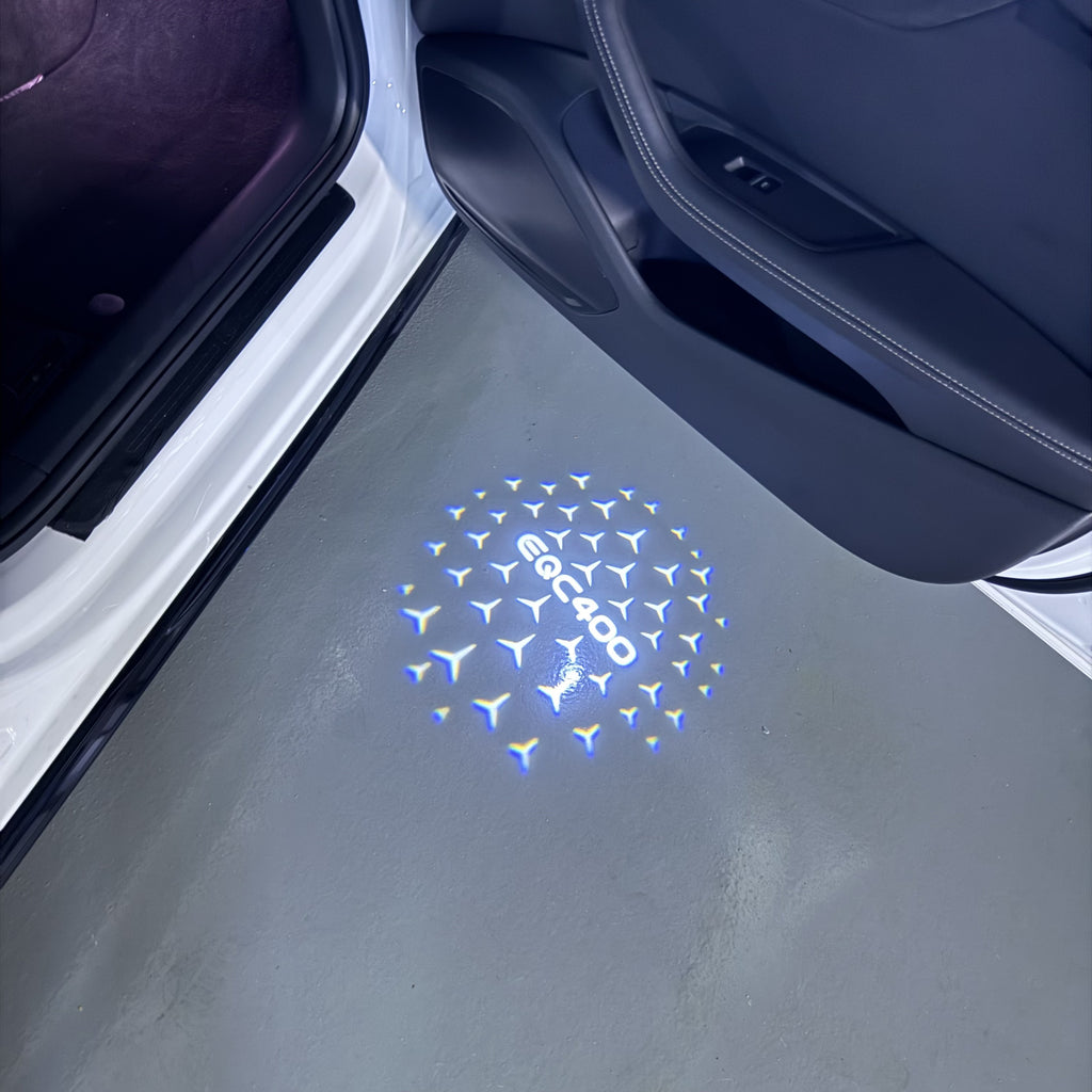 MERCEDES BENZ EQC 400 LOGO PROJECTOT LIGHTS  (quantity 1 = 1 set /2 door lights with 2 logo films)Nr.02M165