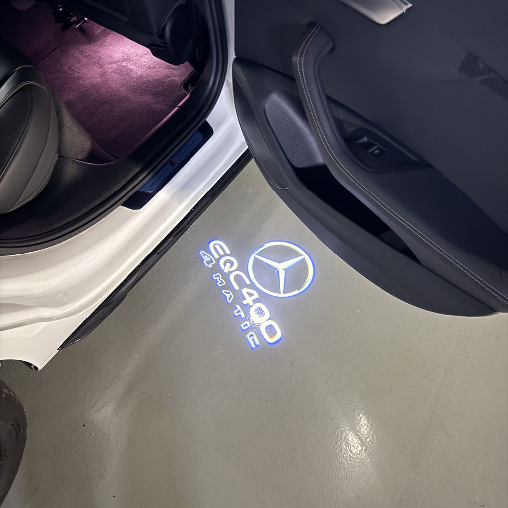 MERCEDES BENZ EQC 400 LOGO PROJECTOT LIGHTS  (quantity 1 = 1 set /2 door lights with 2 logo films)Nr.02M164