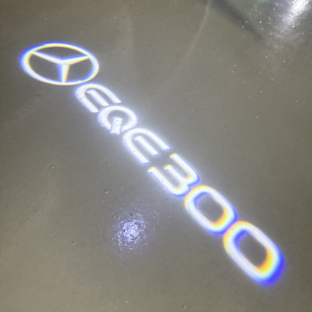 MERCEDES BENZ EQE 300 LOGO PROJECTOT LIGHTS  (quantity 1 = 1 set /2 door lights with 2 logo films)Nr.02M175