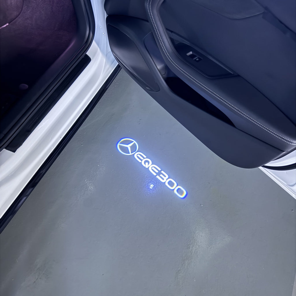MERCEDES BENZ EQE 300 LOGO PROJECTOT LIGHTS  (quantity 1 = 1 set /2 door lights with 2 logo films)Nr.02M175