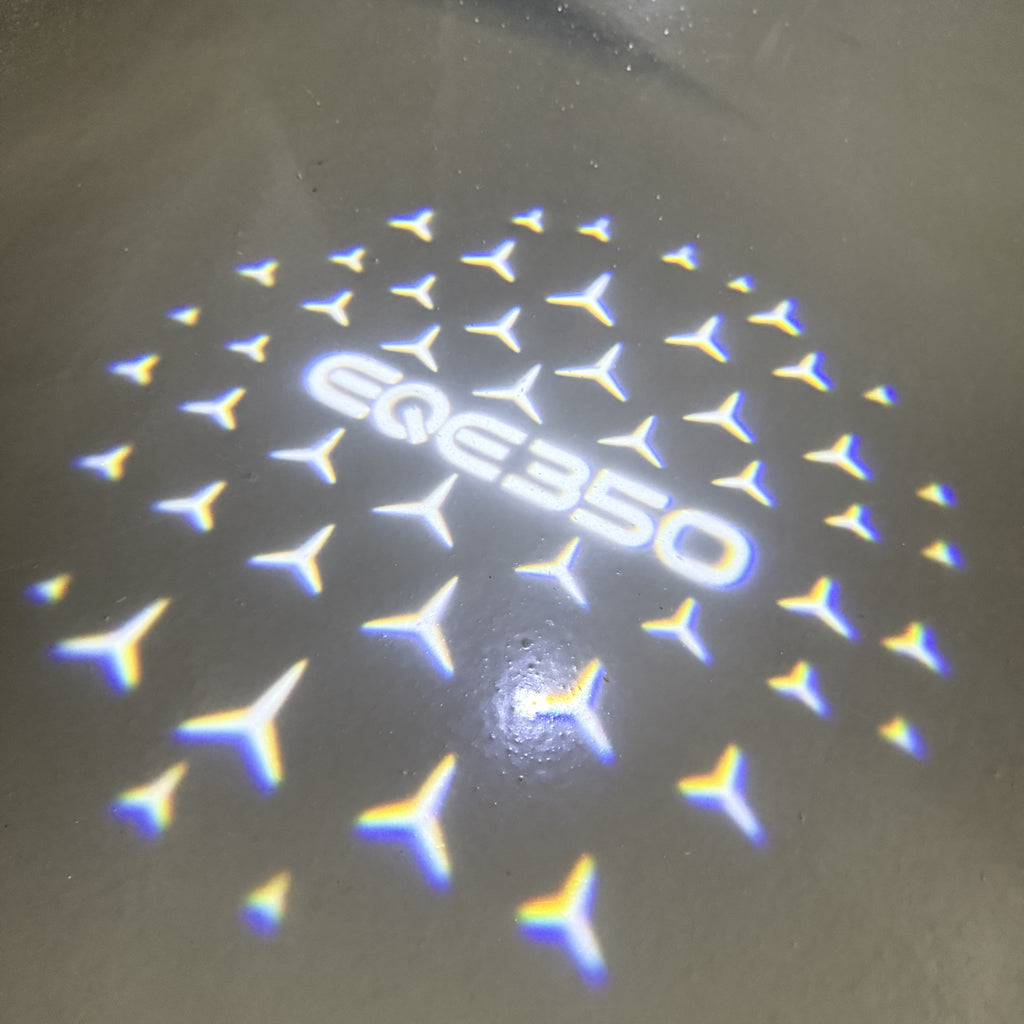 MERCEDES BENZ EQE 350 LOGO PROJECTOT LIGHTS  (quantity 1 = 1 set /2 door lights with 2 logo films)Nr.02M166