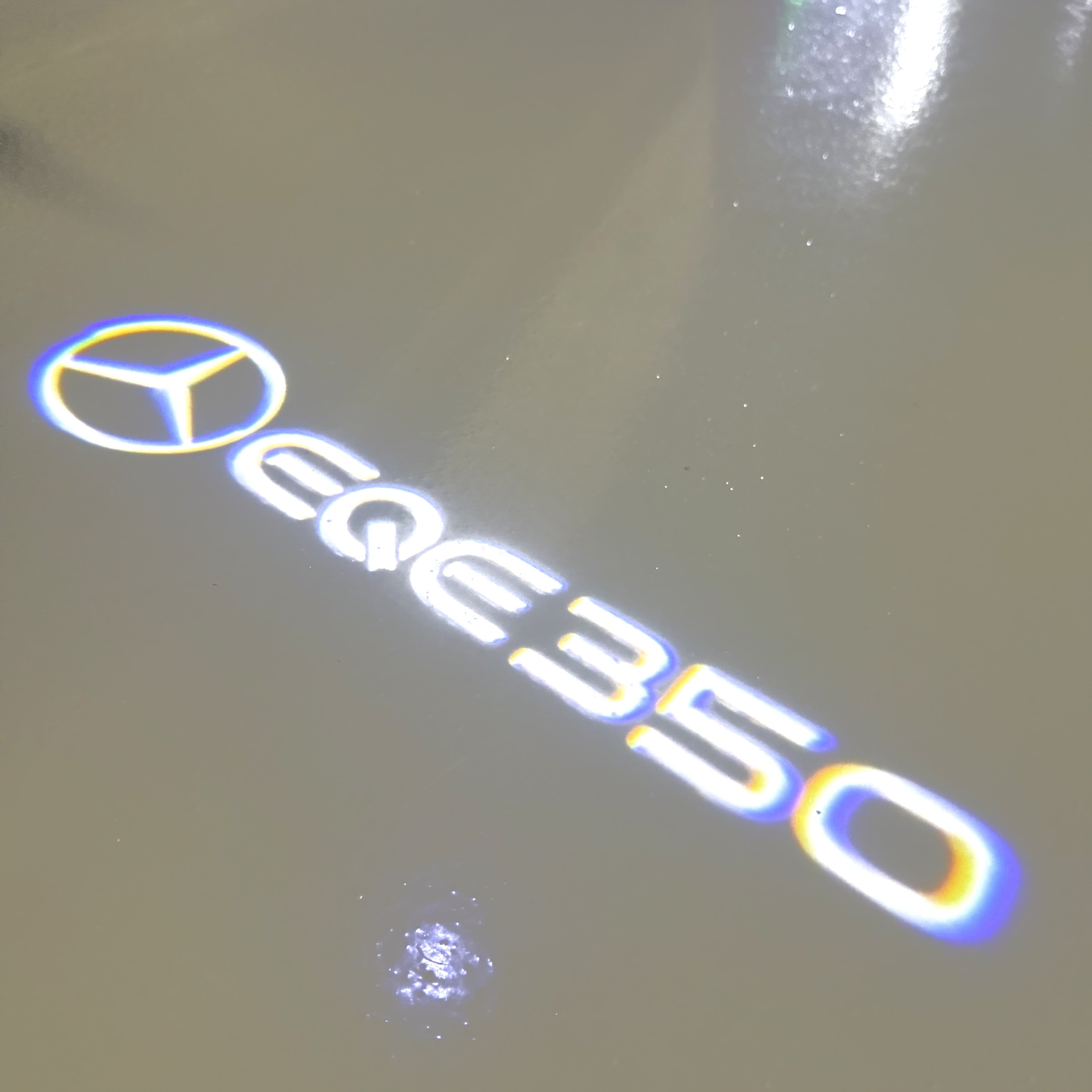 MERCEDES BENZ EQE 350 LOGO PROJECTOT LIGHTS  (quantity 1 = 1 set /2 door lights with 2 logo films)Nr.02M178