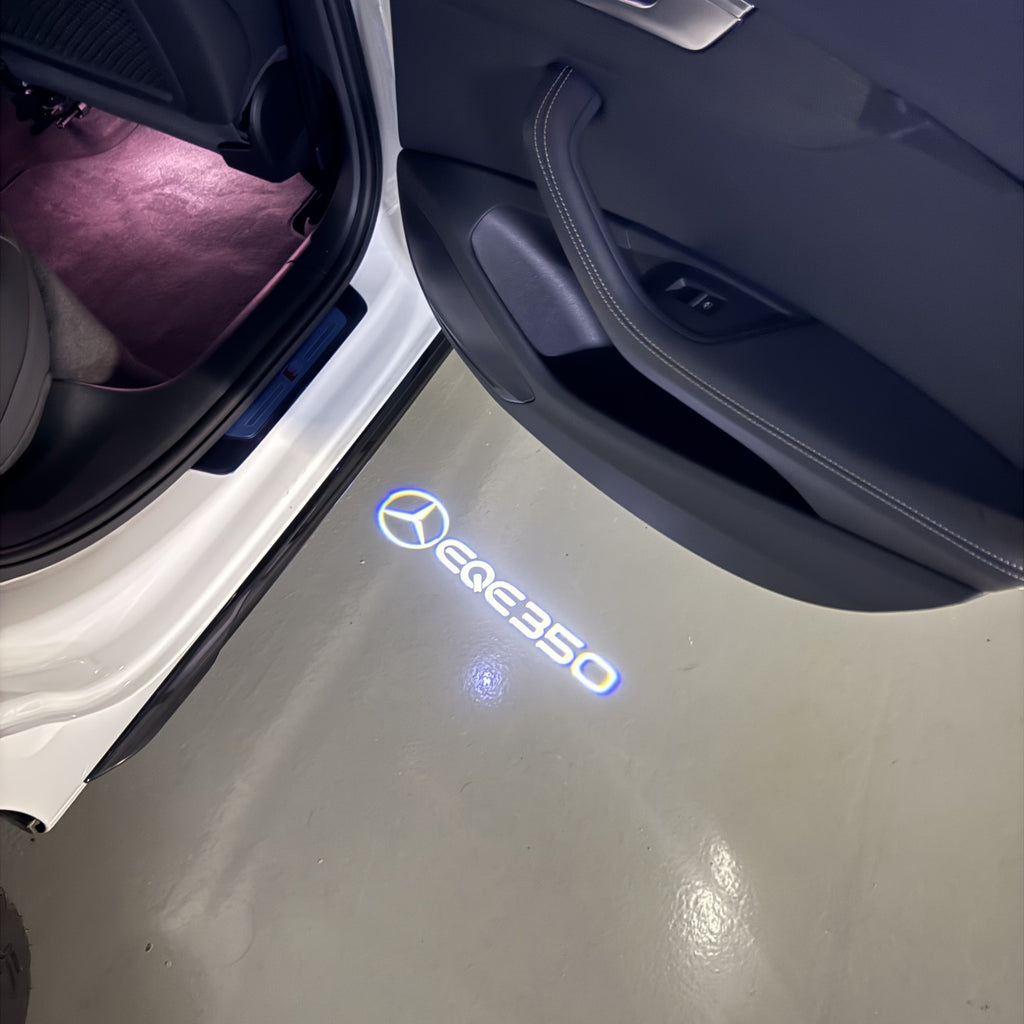 MERCEDES BENZ EQE 350 LOGO PROJECTOT LIGHTS  (quantity 1 = 1 set /2 door lights with 2 logo films)Nr.02M178