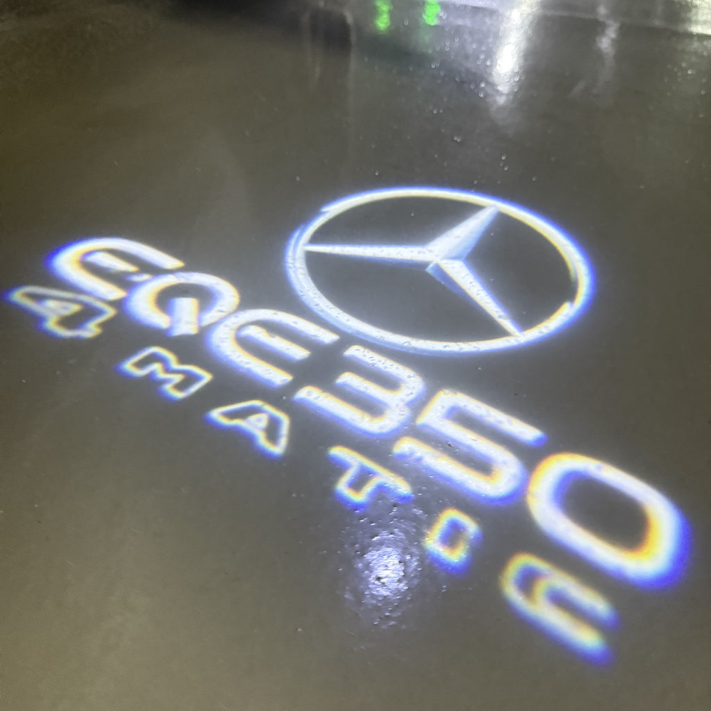 MERCEDES BENZ EQE 350 LOGO PROJECTOT LIGHTS  (quantity 1 = 1 set /2 door lights with 2 logo films)Nr.02M171