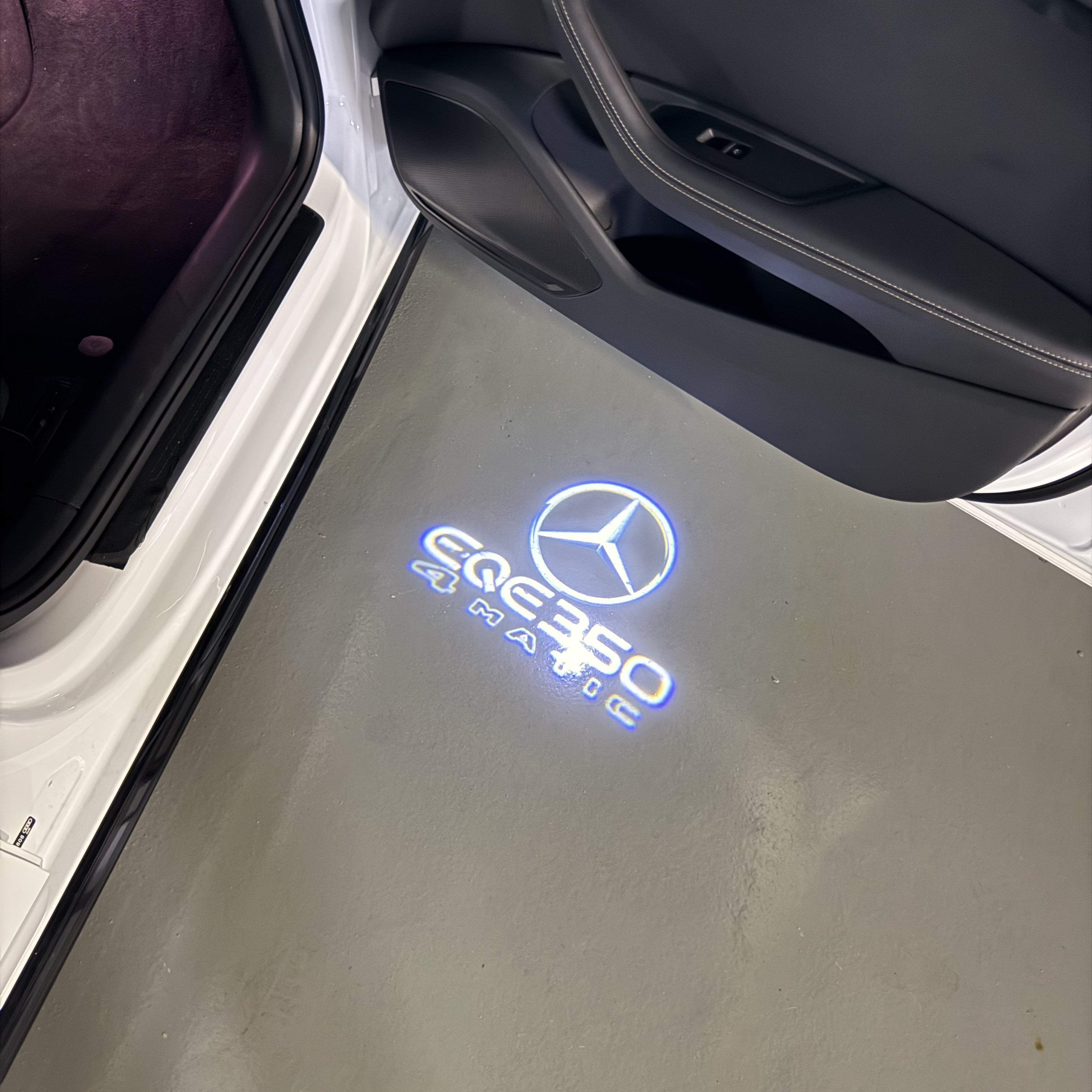 MERCEDES BENZ EQE 350 LOGO PROJECTOT LIGHTS  (quantity 1 = 1 set /2 door lights with 2 logo films)Nr.02M171