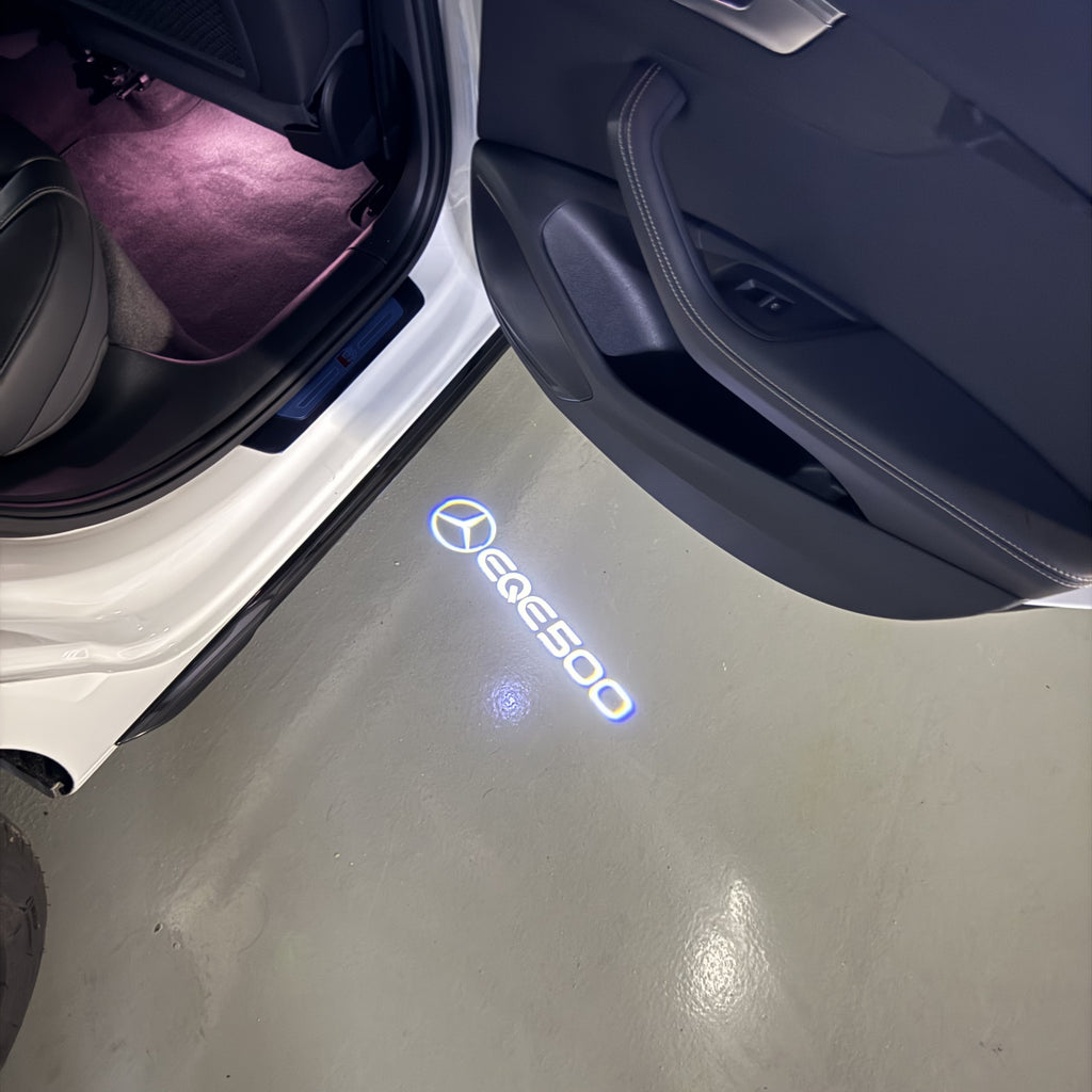 MERCEDES BENZ EQE 500 LOGO PROJECTOT LIGHTS  (quantity 1 = 1 set /2 door lights with 2 logo films)Nr.02M174
