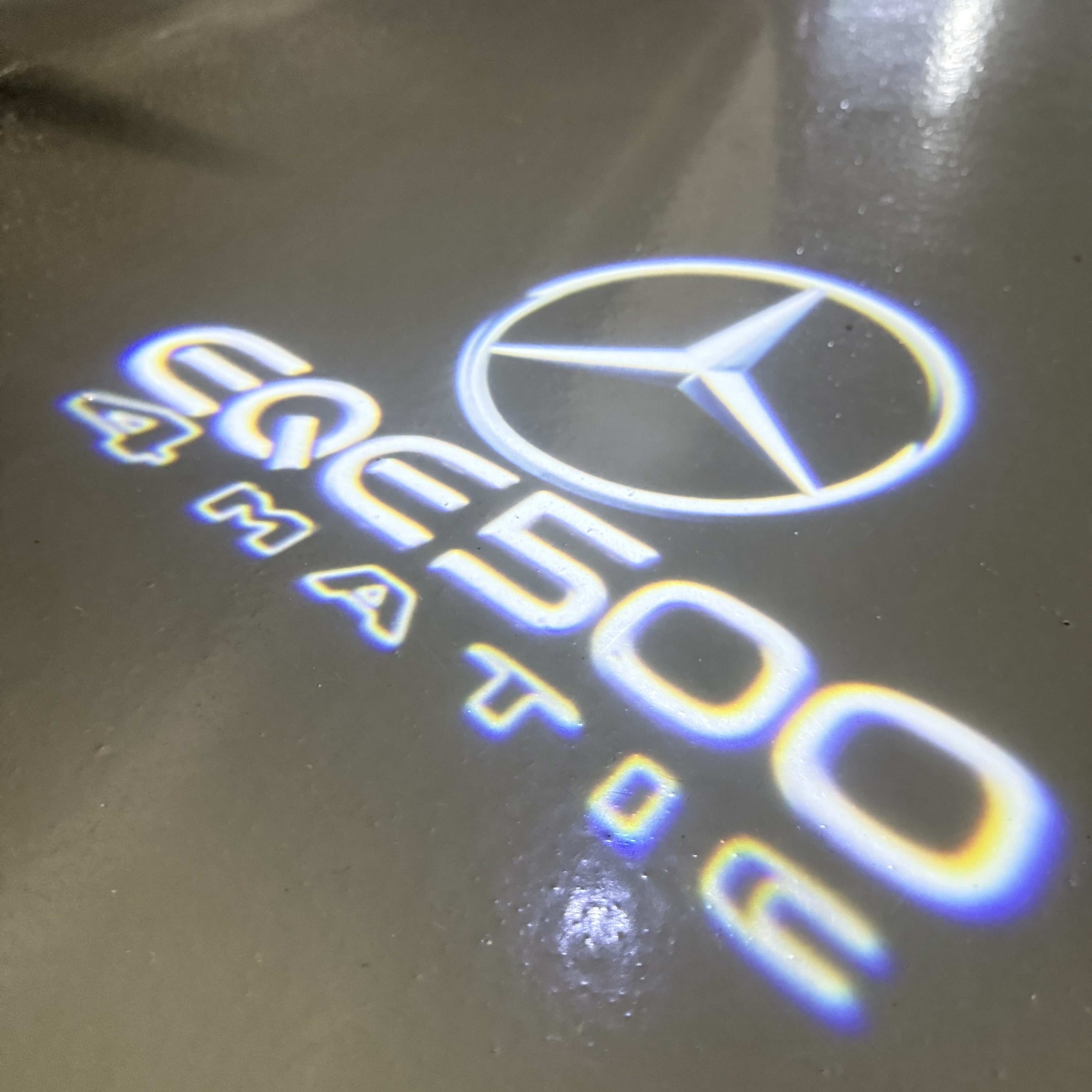 MERCEDES BENZ EQE 500 LOGO PROJECTOT LIGHTS  (quantity 1 = 1 set /2 door lights with 2 logo films)Nr.02M168