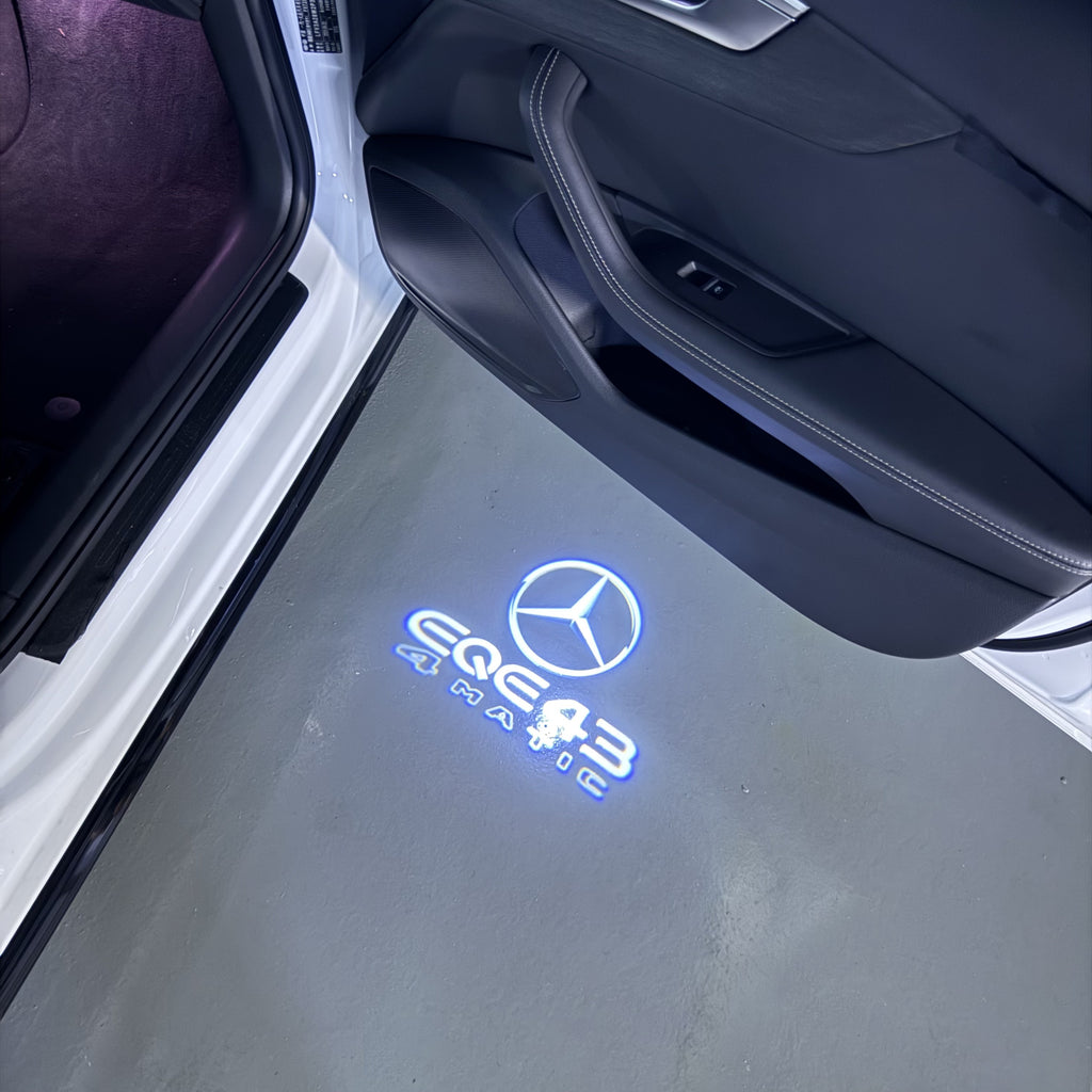 MERCEDES BENZ EQE 43 LOGO PROJECTOT LIGHTS  (quantity 1 = 1 set /2 door lights with 2 logo films)Nr.02M180